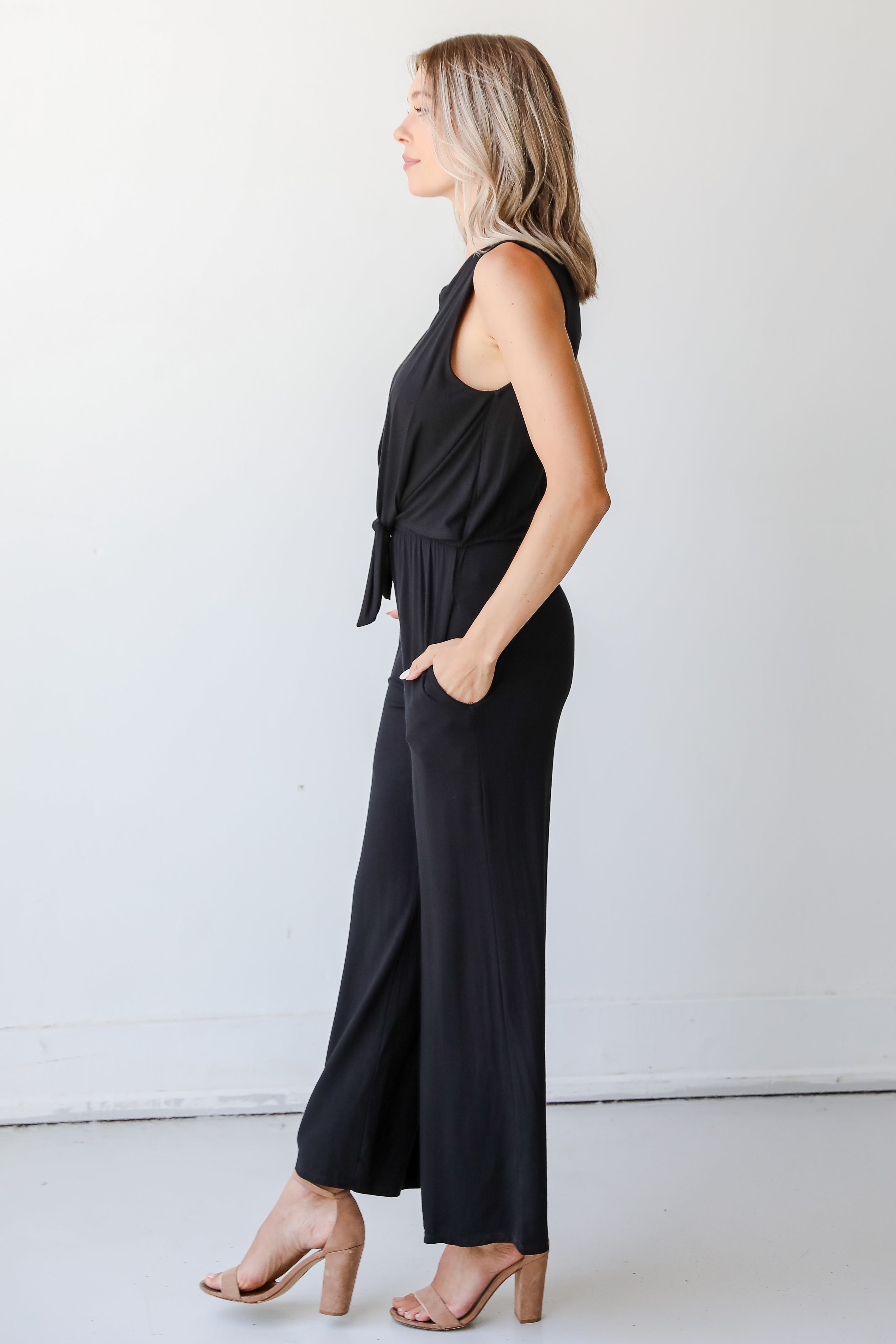black jumpsuit side view