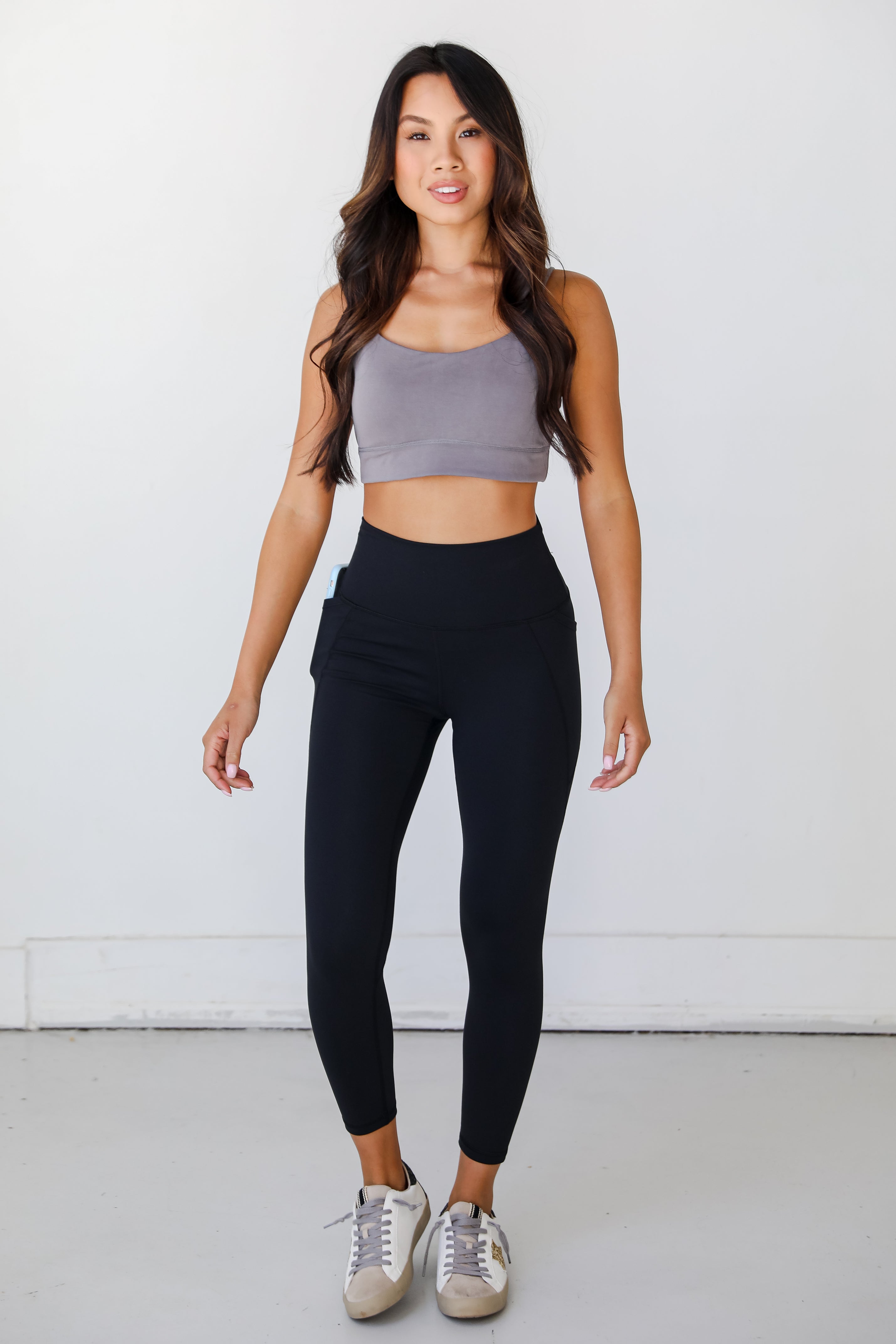 black High-Waisted 7/8 Leggings on dress up model