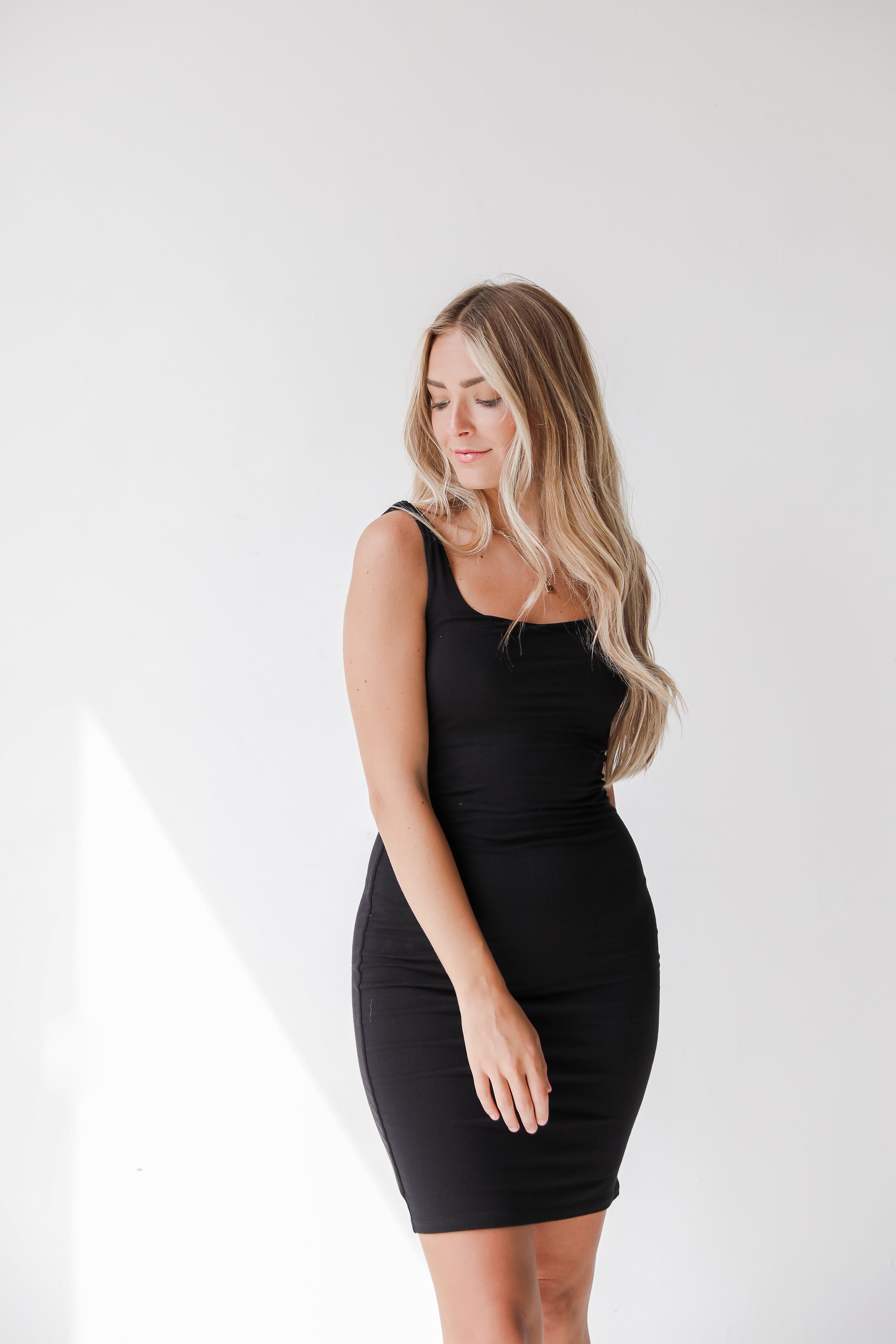 black bodycon dress from dress up