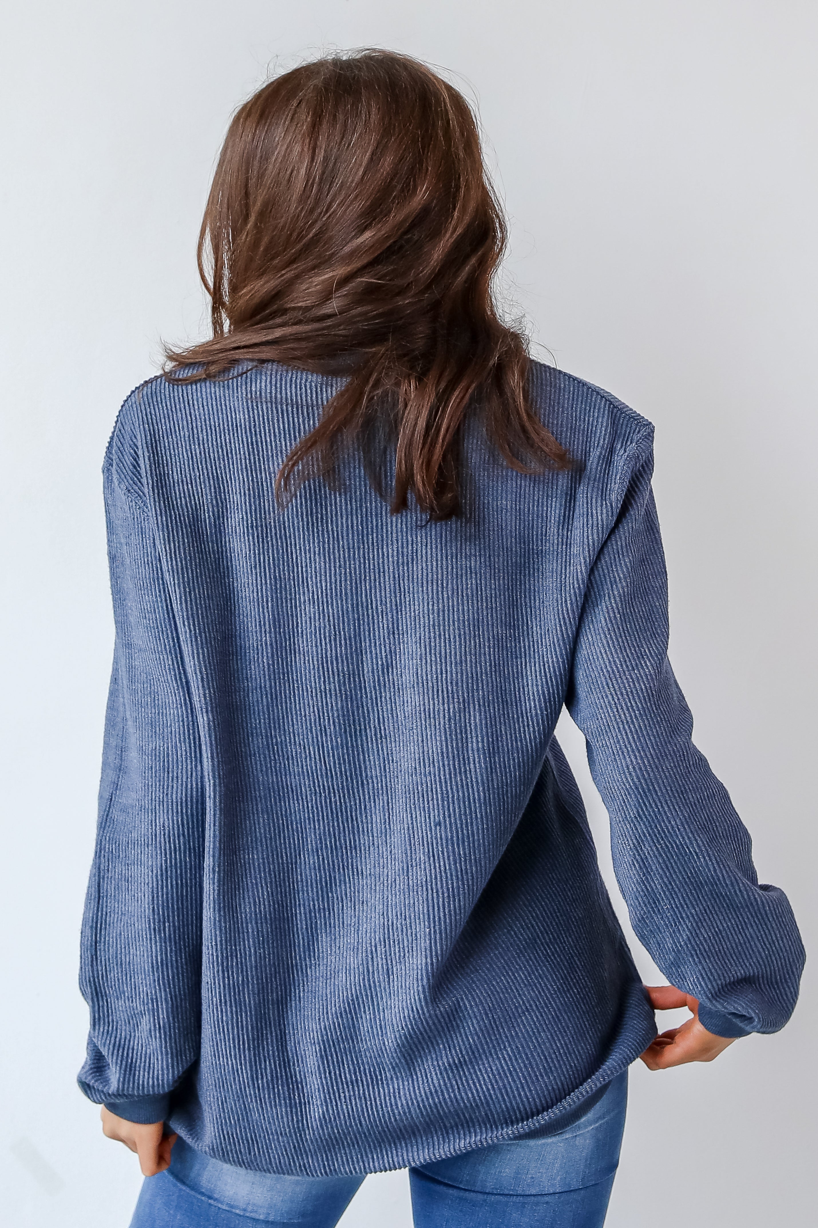 This comfy sweatshirt is designed with a soft and stretchy corded knit. It features a crew neckline, long sleeves, an oversized fit, and the words "Chop Chop" on the front.