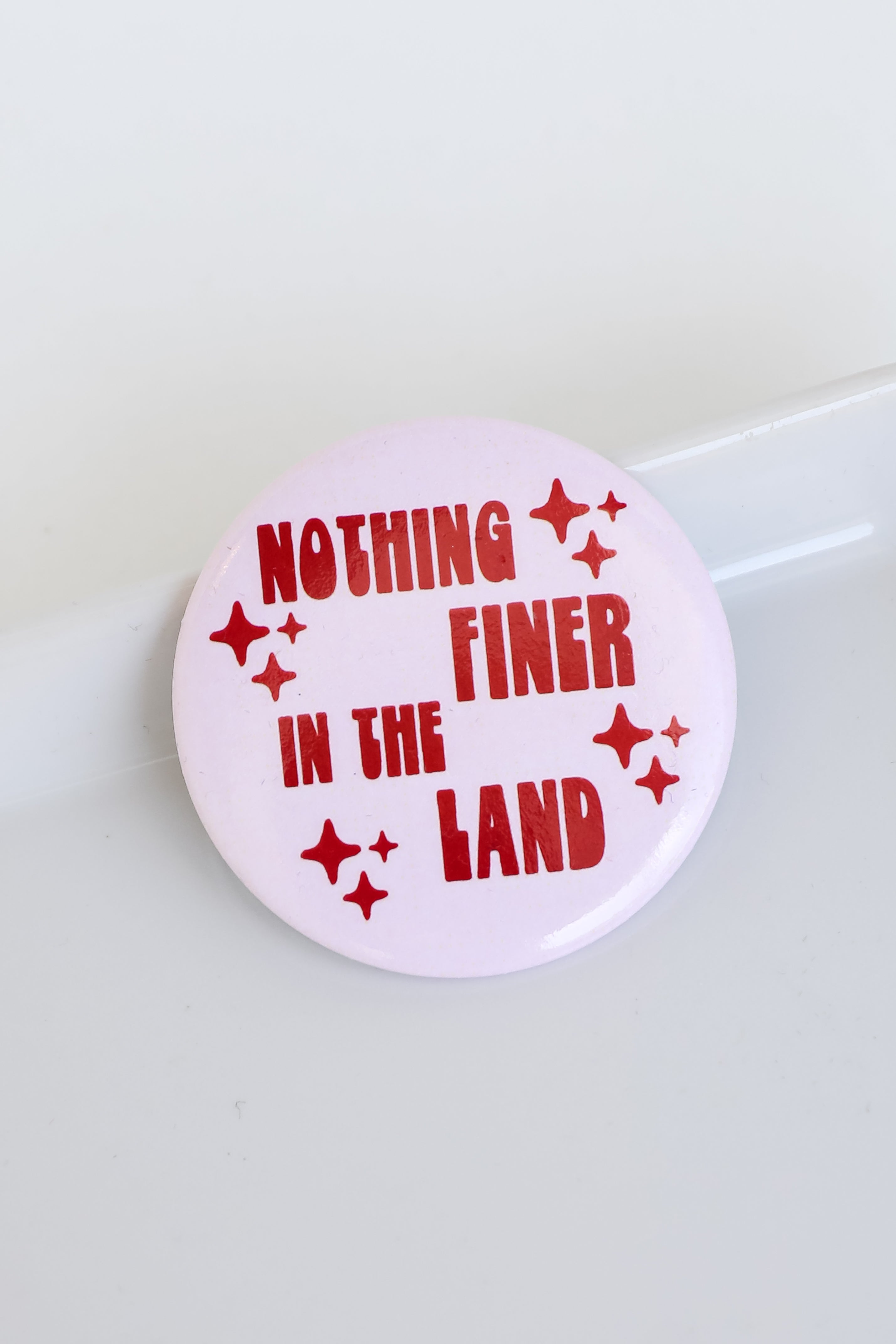 blush Nothing Finer In The Land Button flat lay