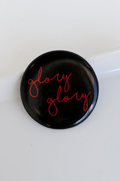black Large Glory Glory Script Button flat lay