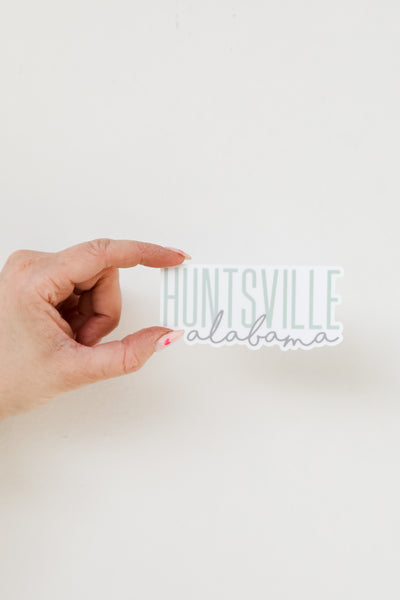 Huntsville Script Sticker flat lay