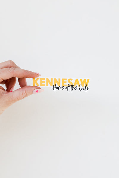 Kennesaw Home Of The Owls Sticker flat lay