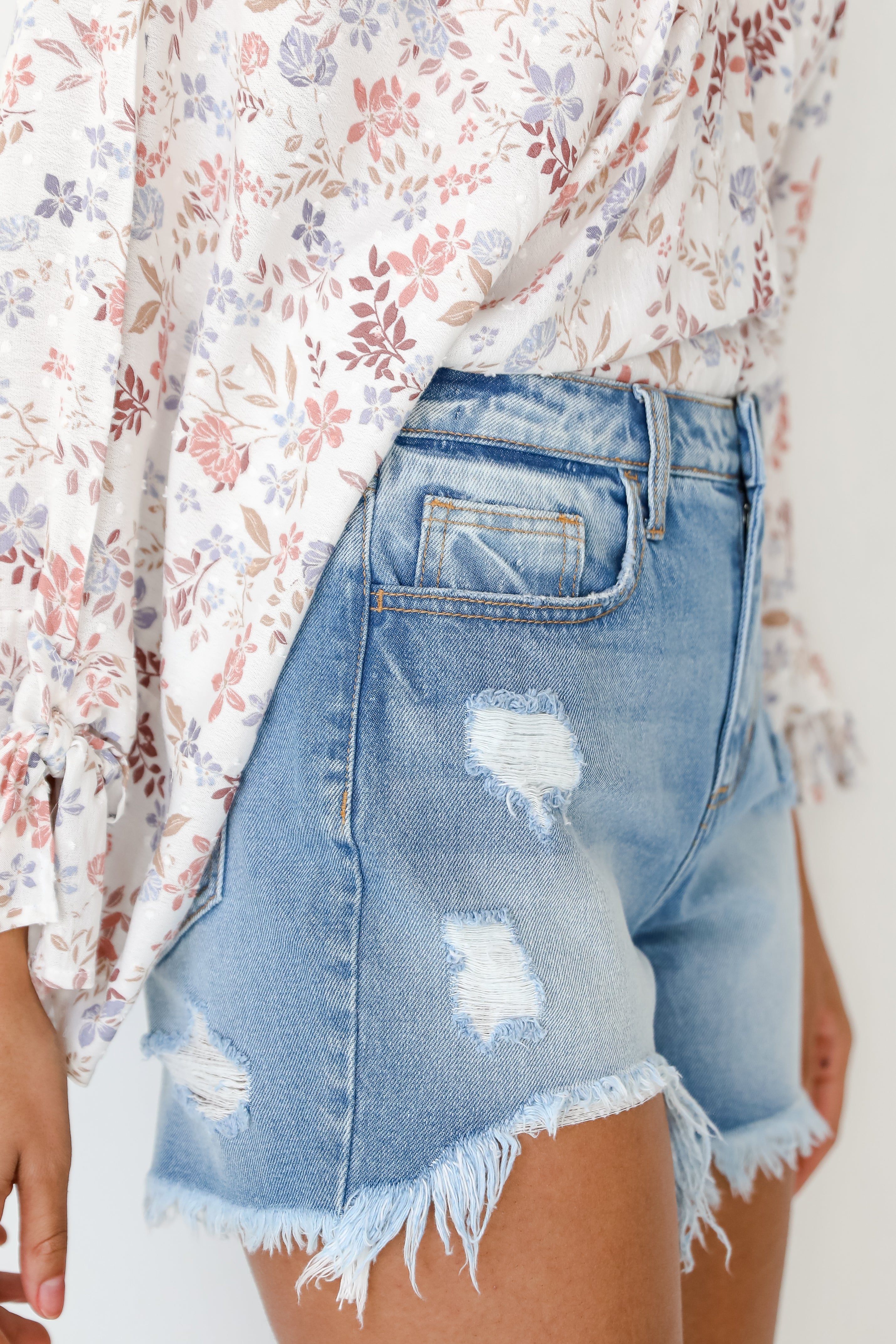 model wearing Distressed Denim Shorts