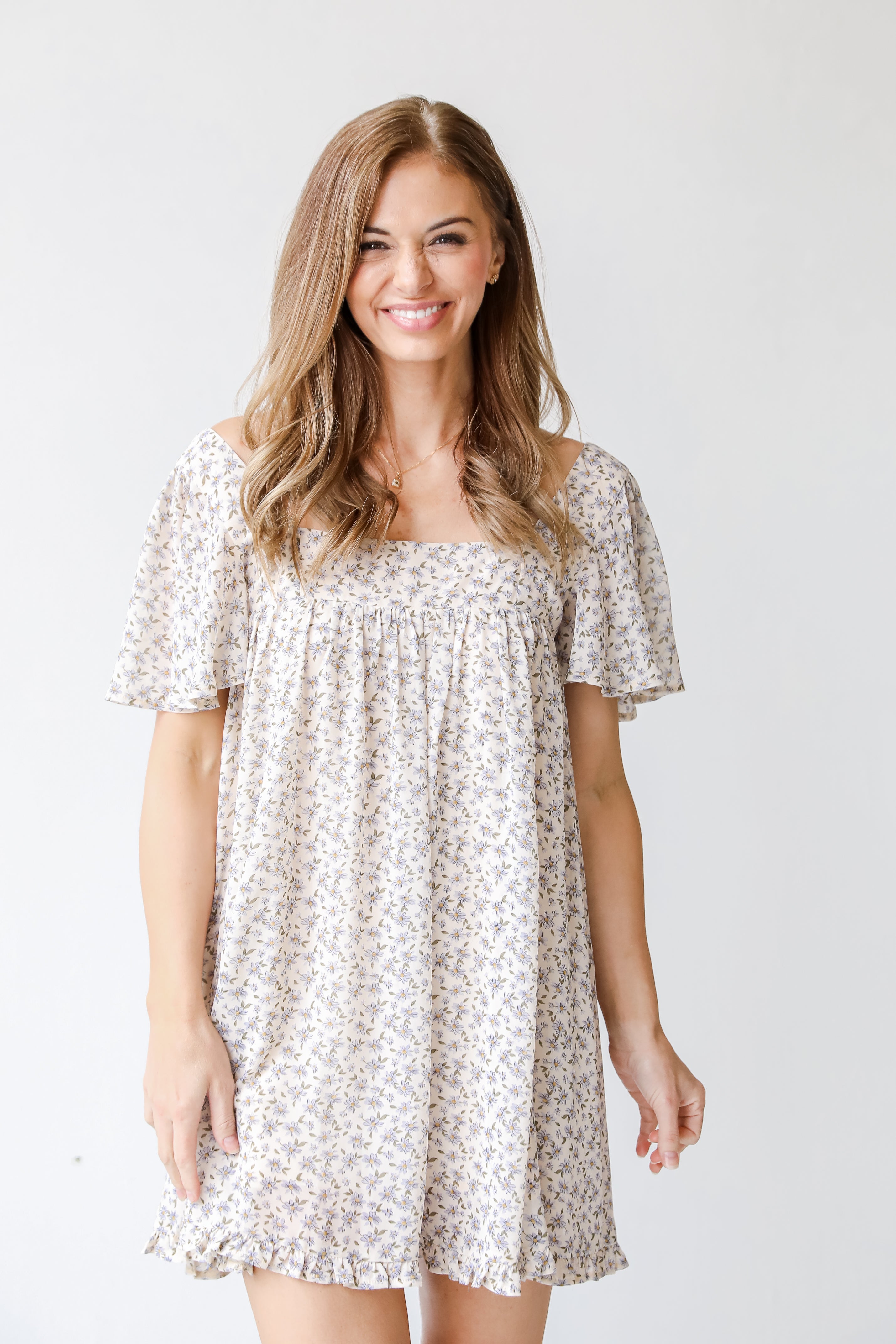 Floral Mini Dress in ivory on model