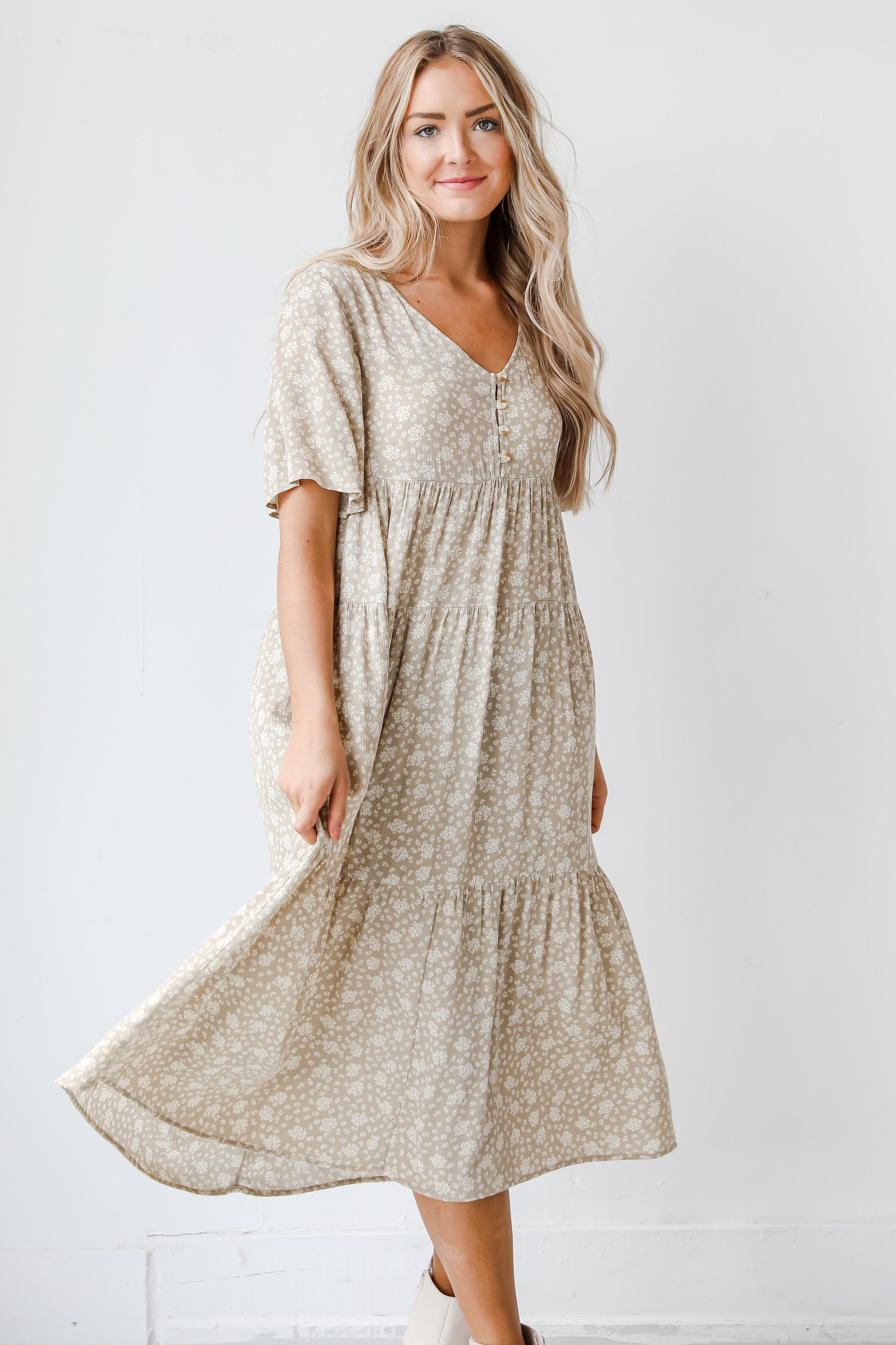 taupe floral midi dress on model