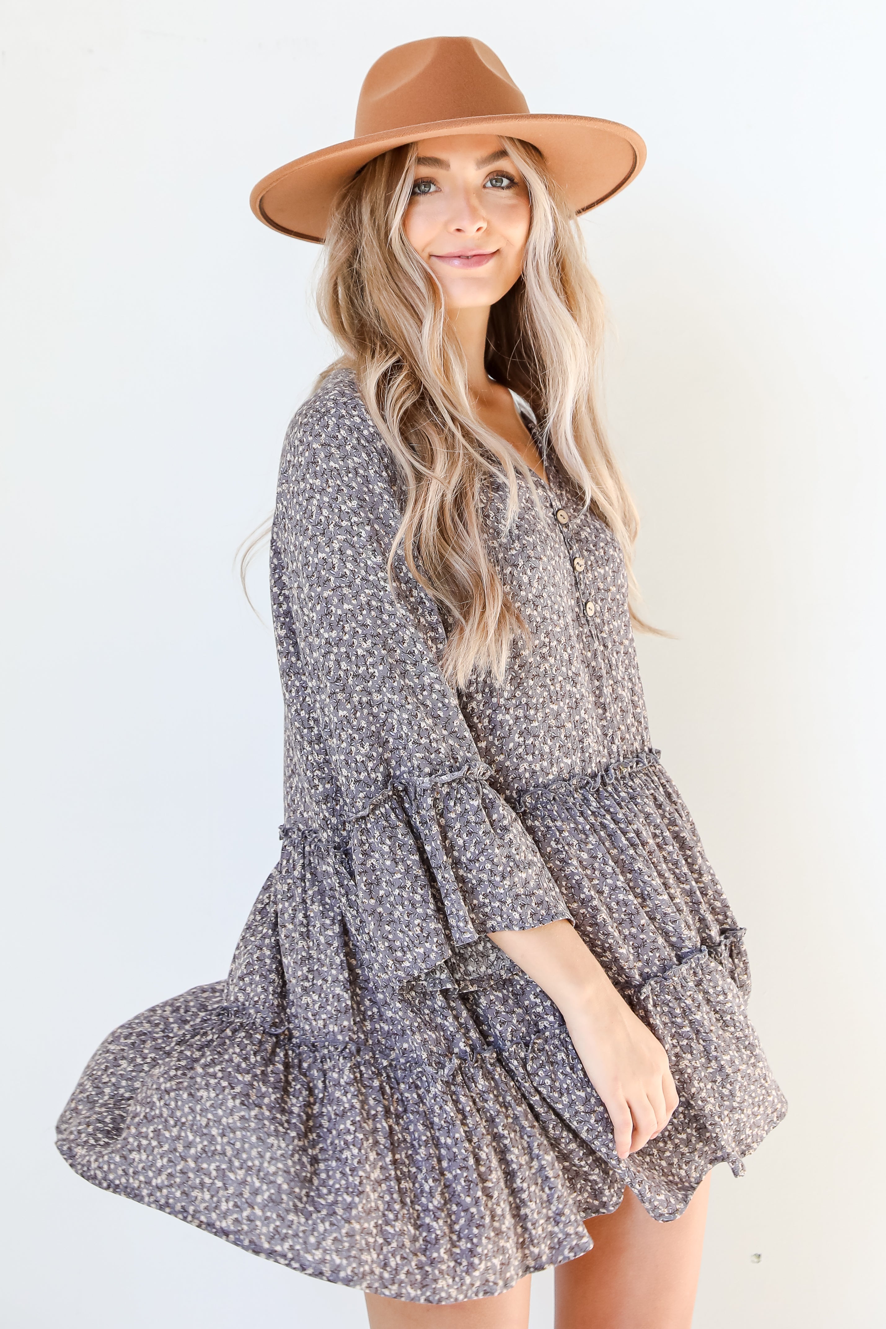 Floral Mini Dress on model with a wide brim hat