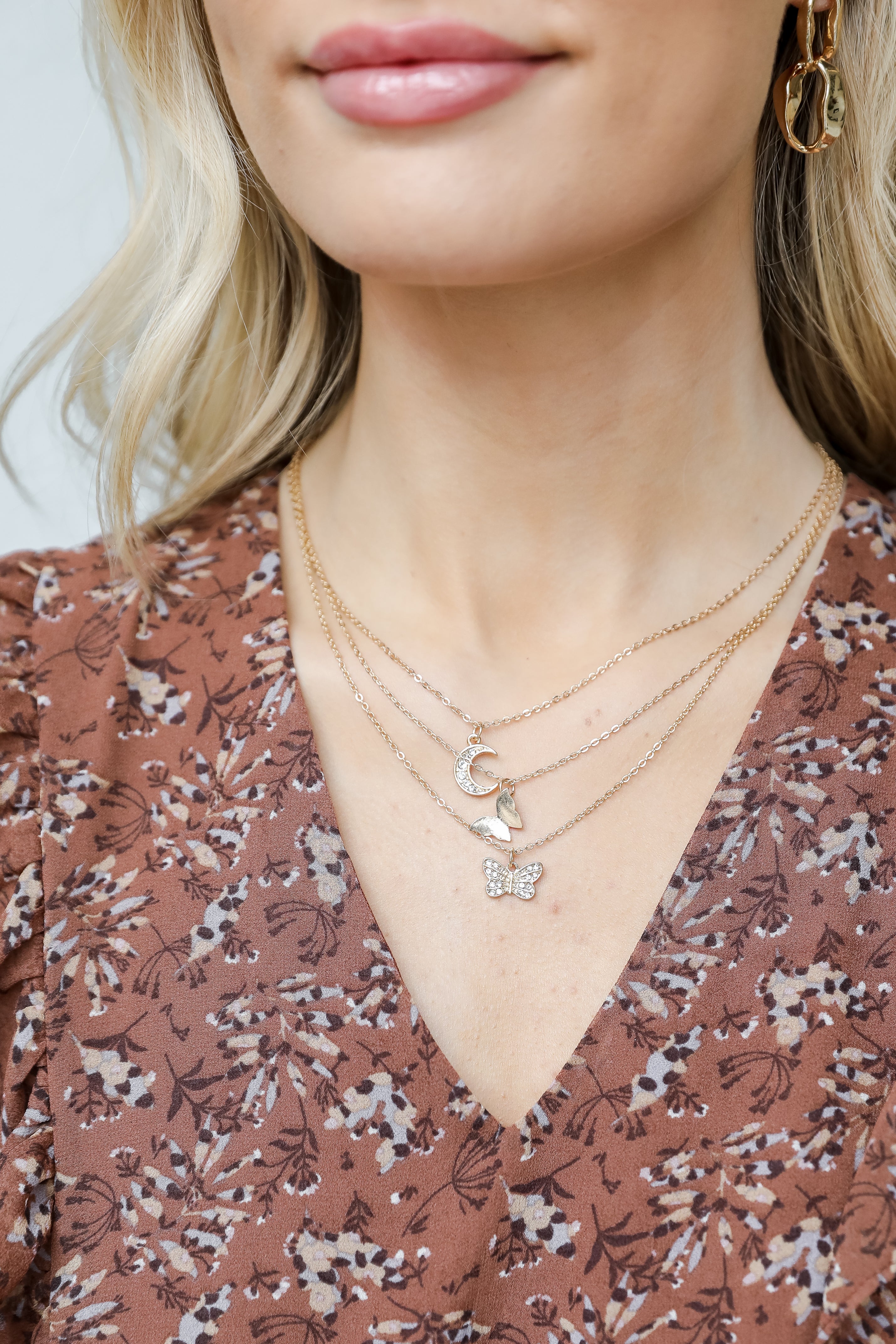 Gold Butterfly + Moon Layered Necklace on model