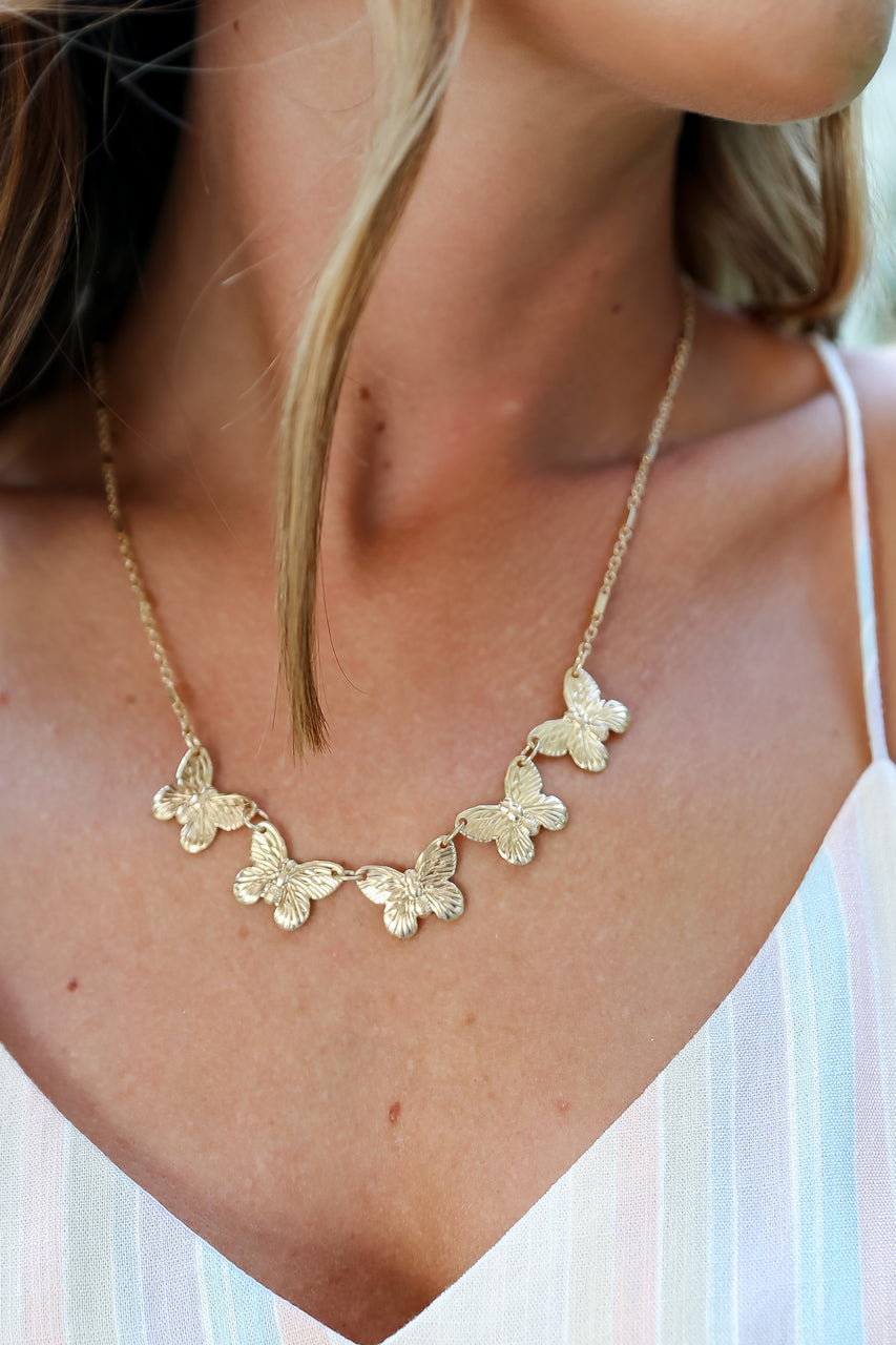 Noelle Gold Butterfly Necklace Dress Up