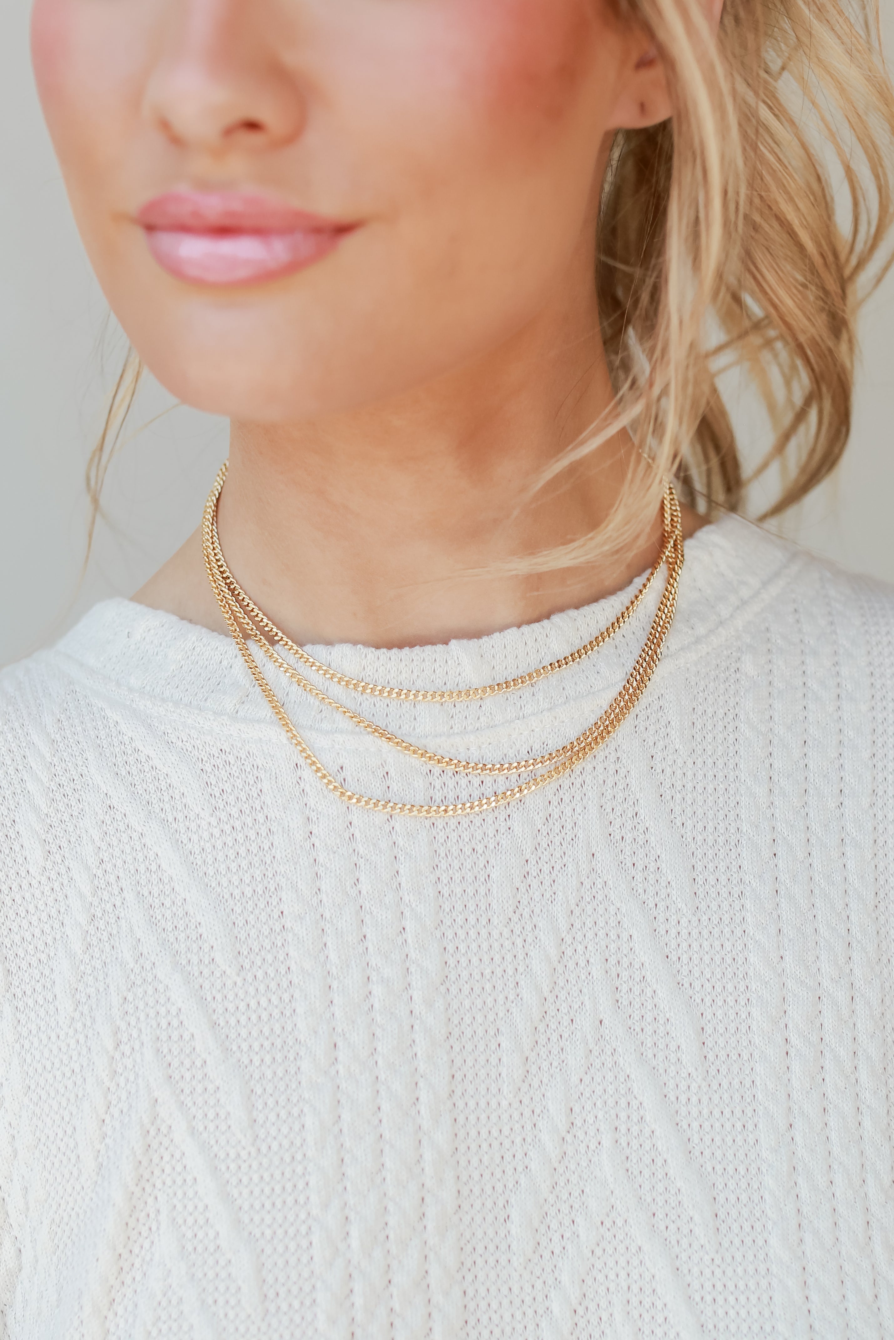 Gold Layered Chain Necklace on model