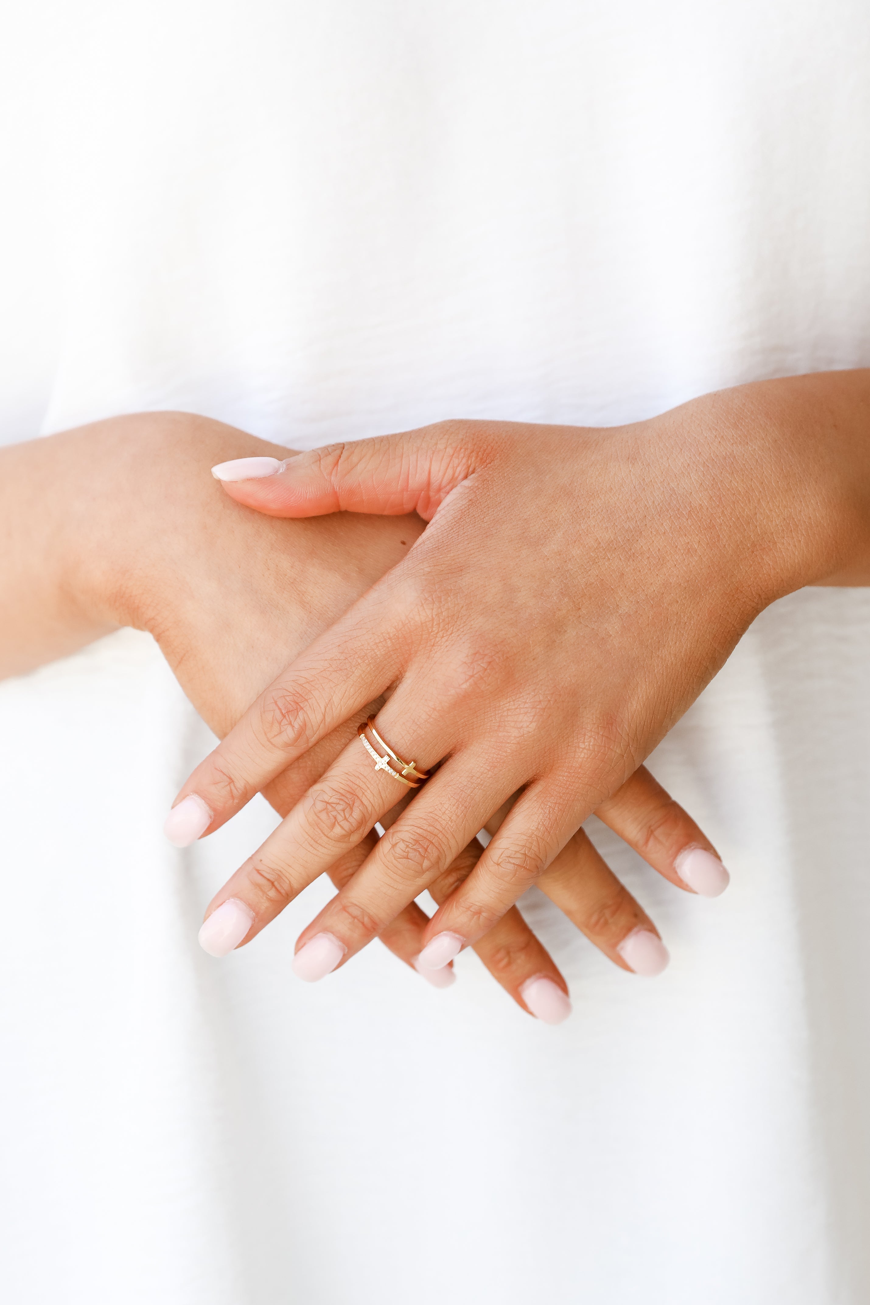 Gold Rhinestone Cross Ring on model
