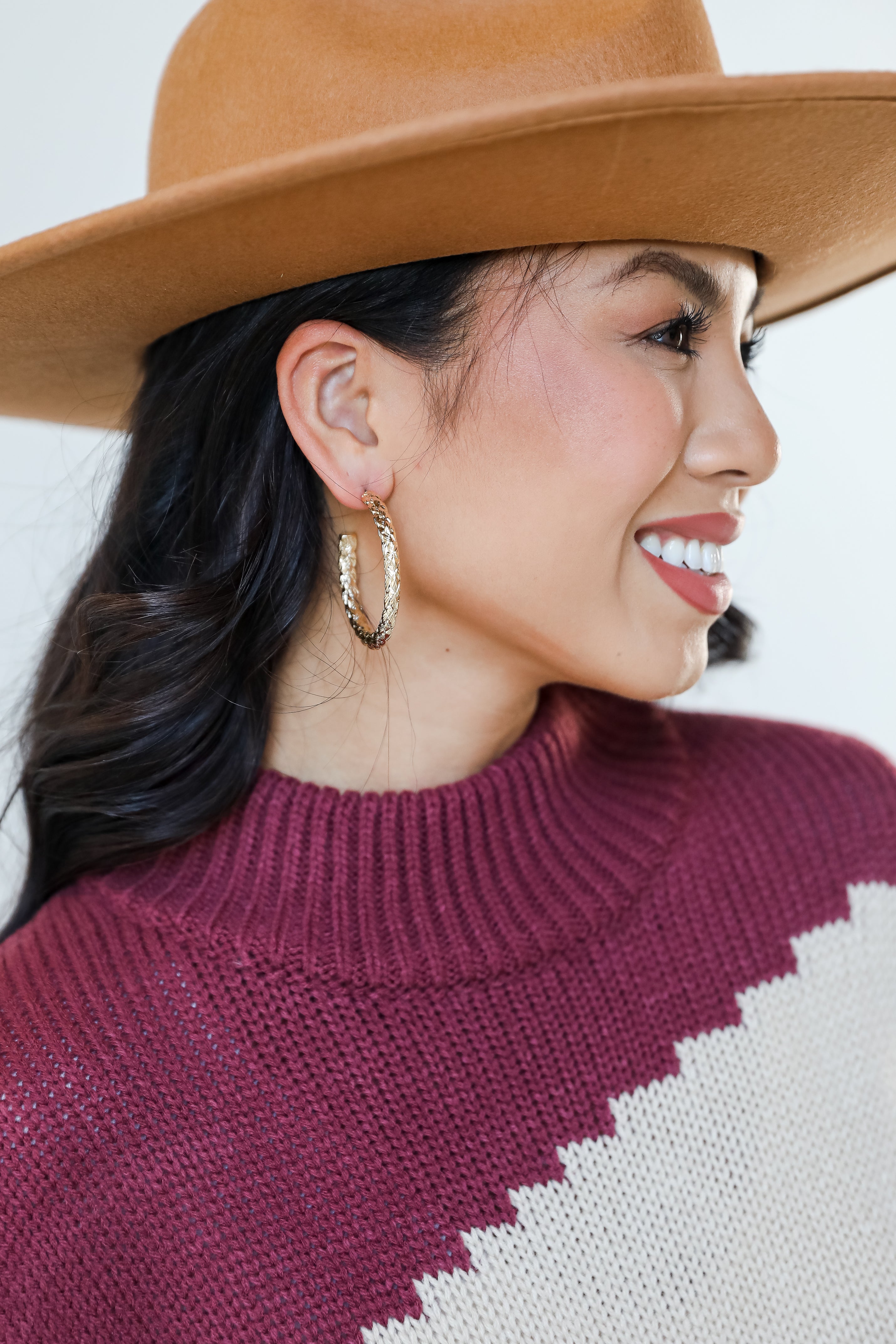 Gold Textured Hoop Earrings on model