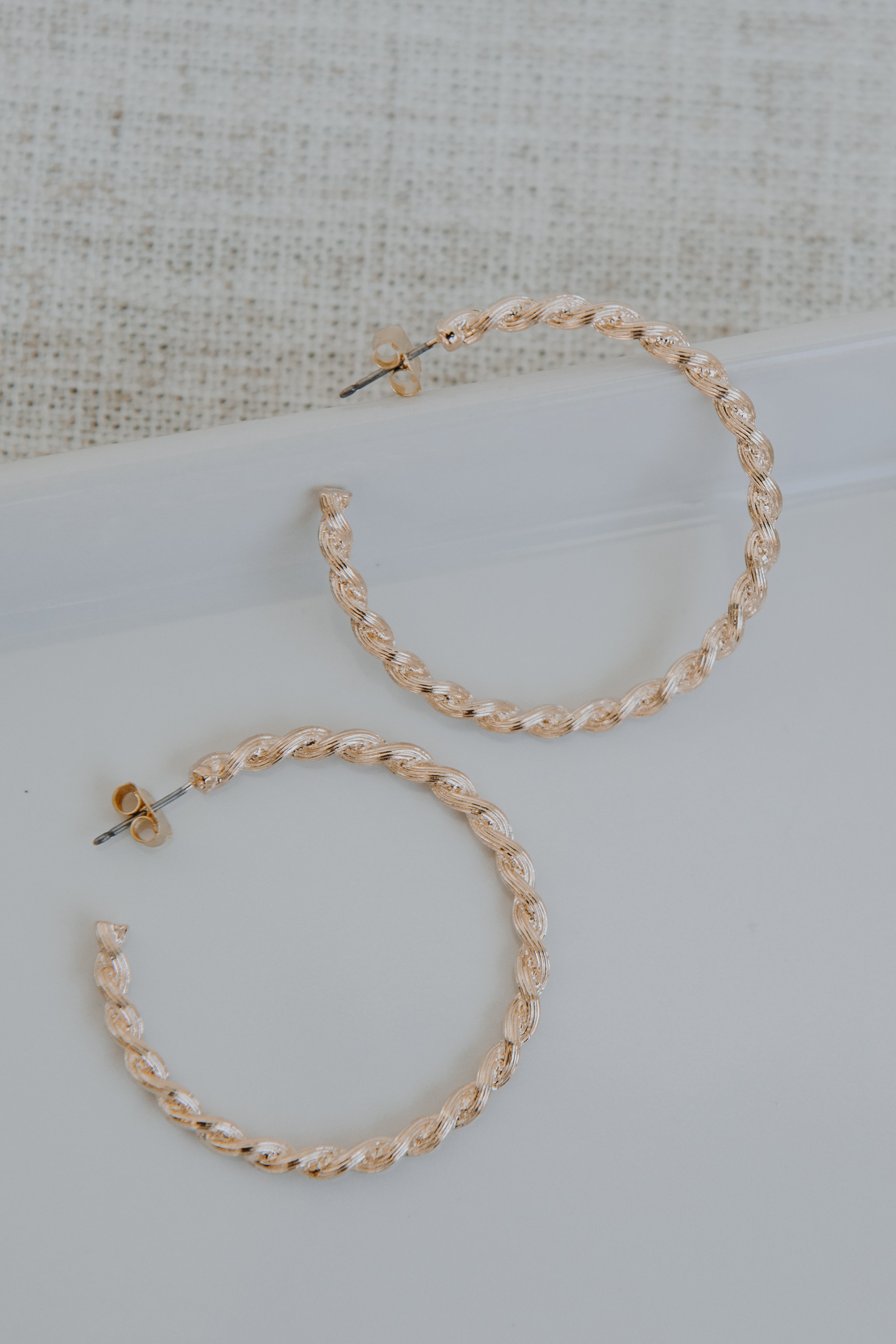 Gold Twisted Hoop Earrings from dress up