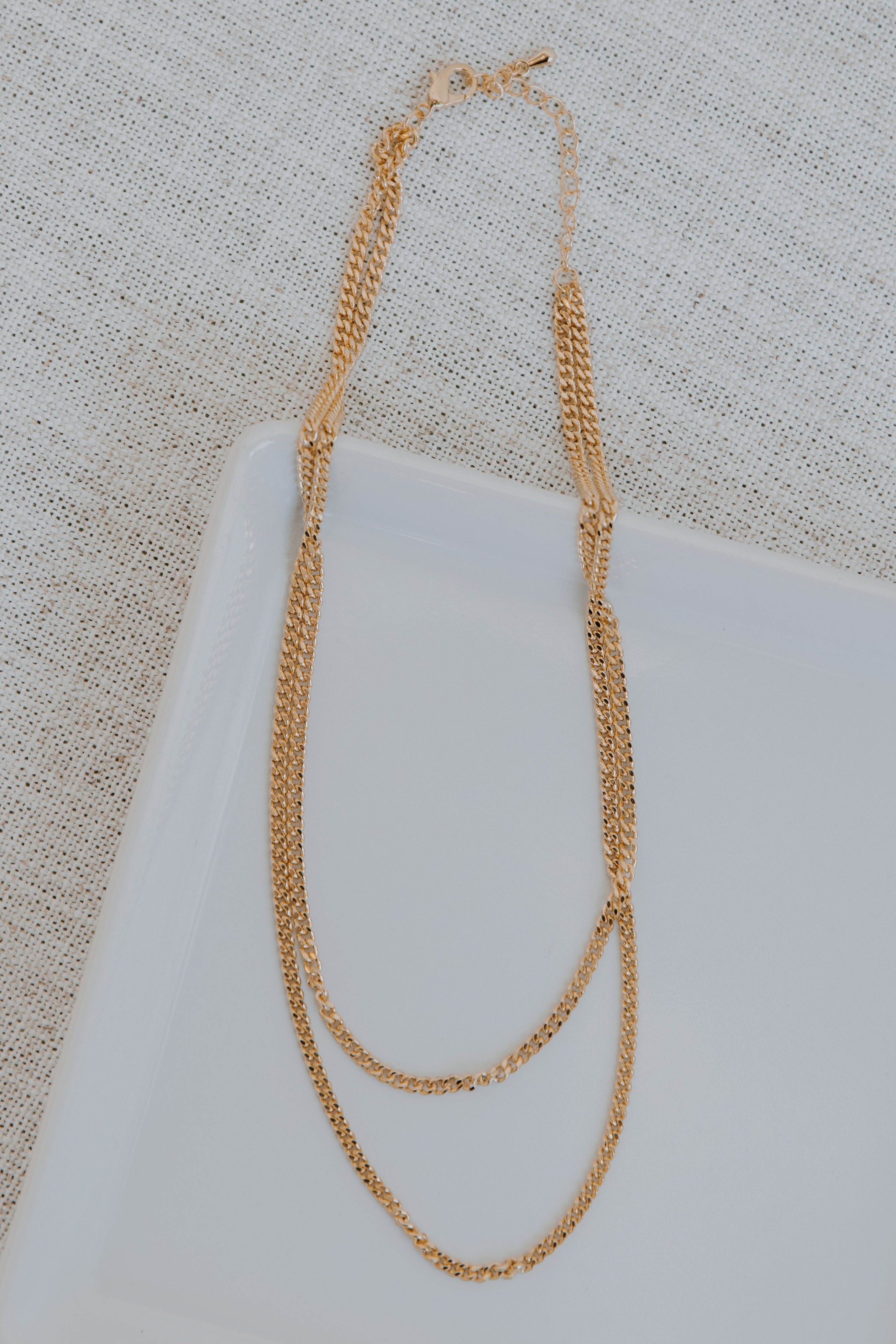 Gold Layered Chain Necklace flat lay