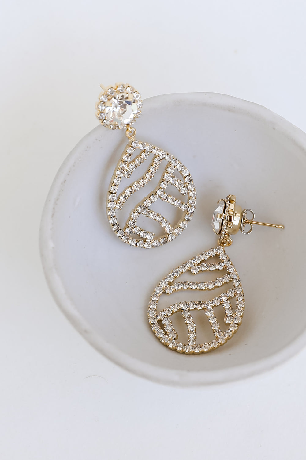 Gold Rhinestone Teardrop Earrings flat lay