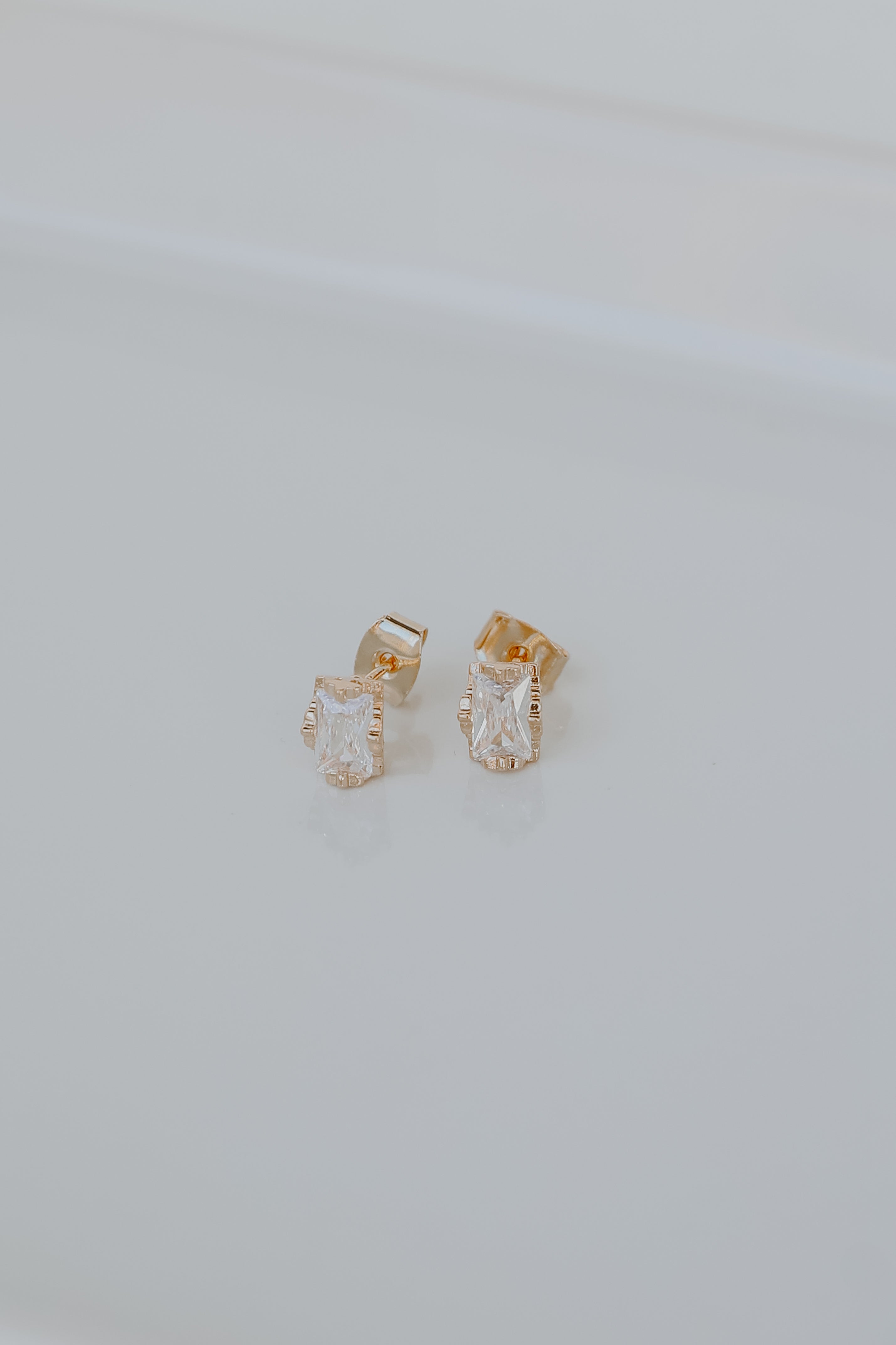Gold Gemstone Stud Earrings flat lay