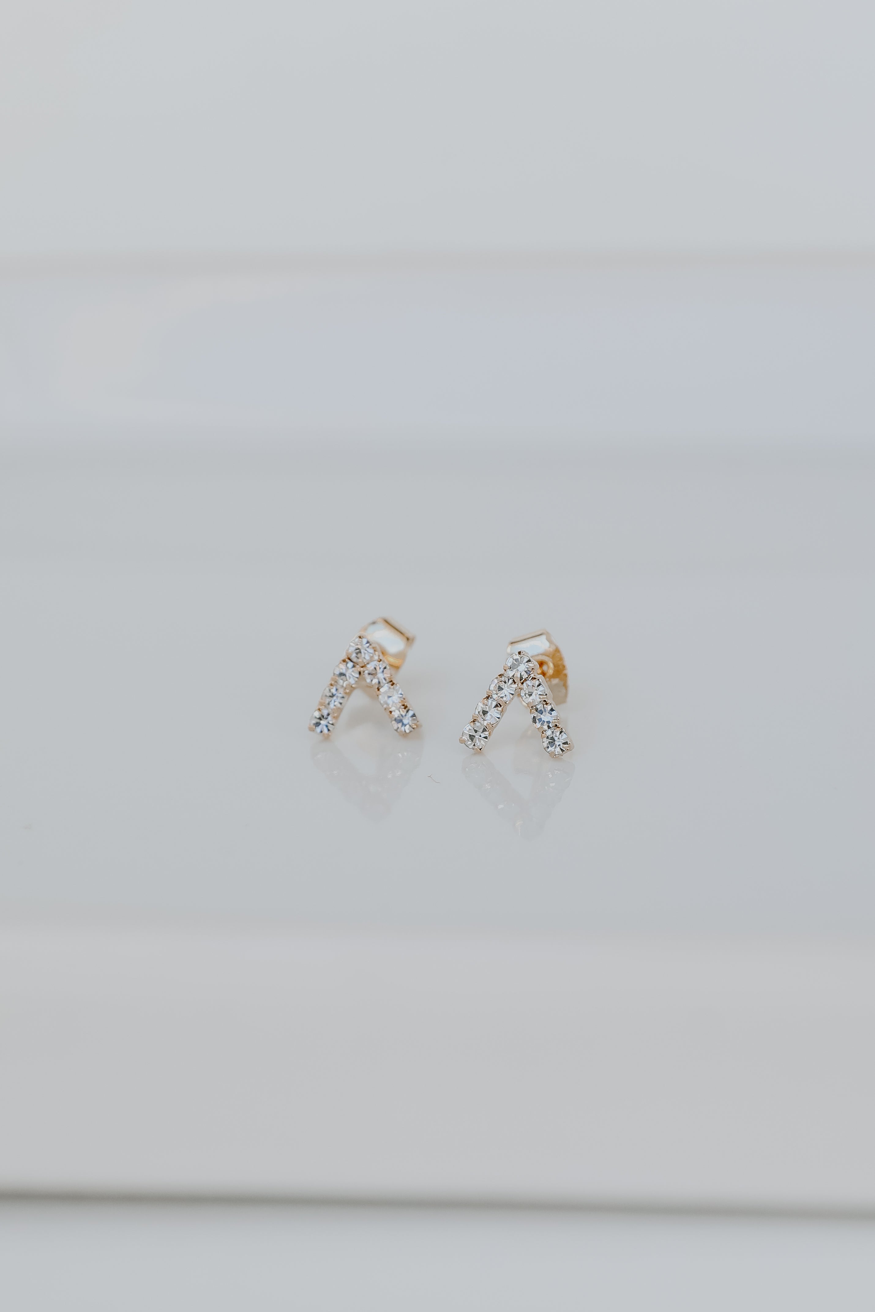 Gold Rhinestone V Stud Earrings from dress up