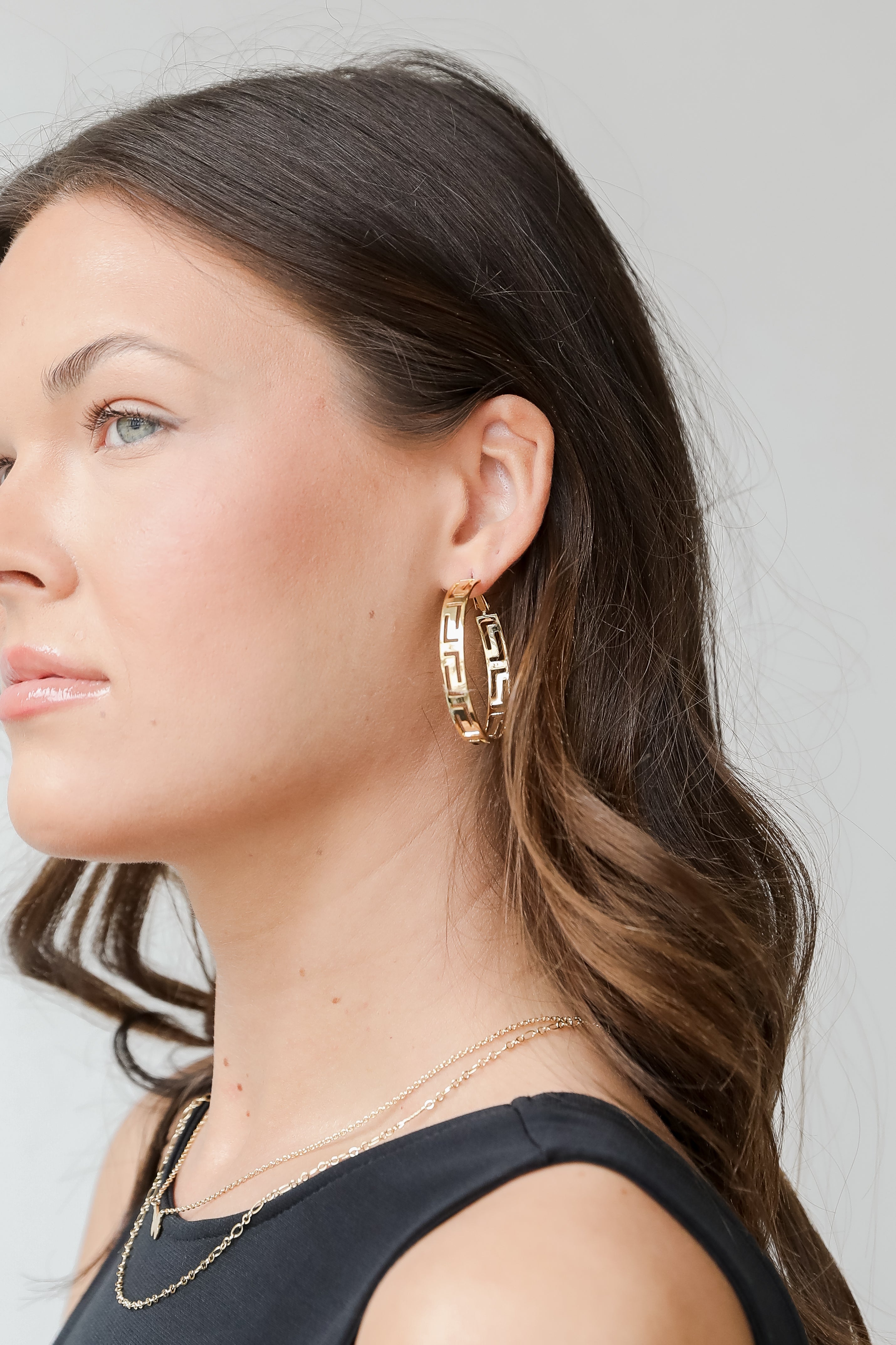 Gold Hoop Earrings on model