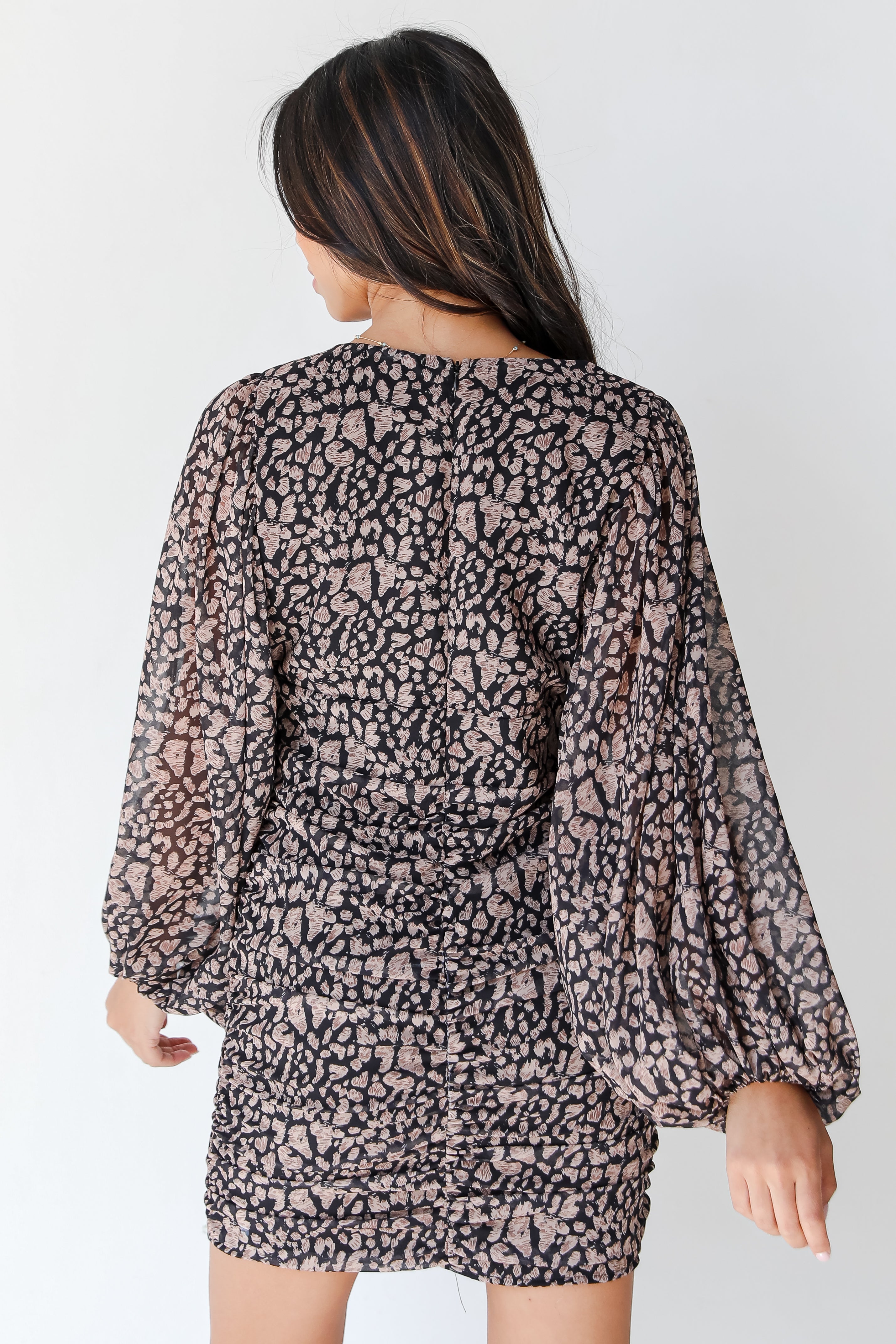 back view of a leopard dress
