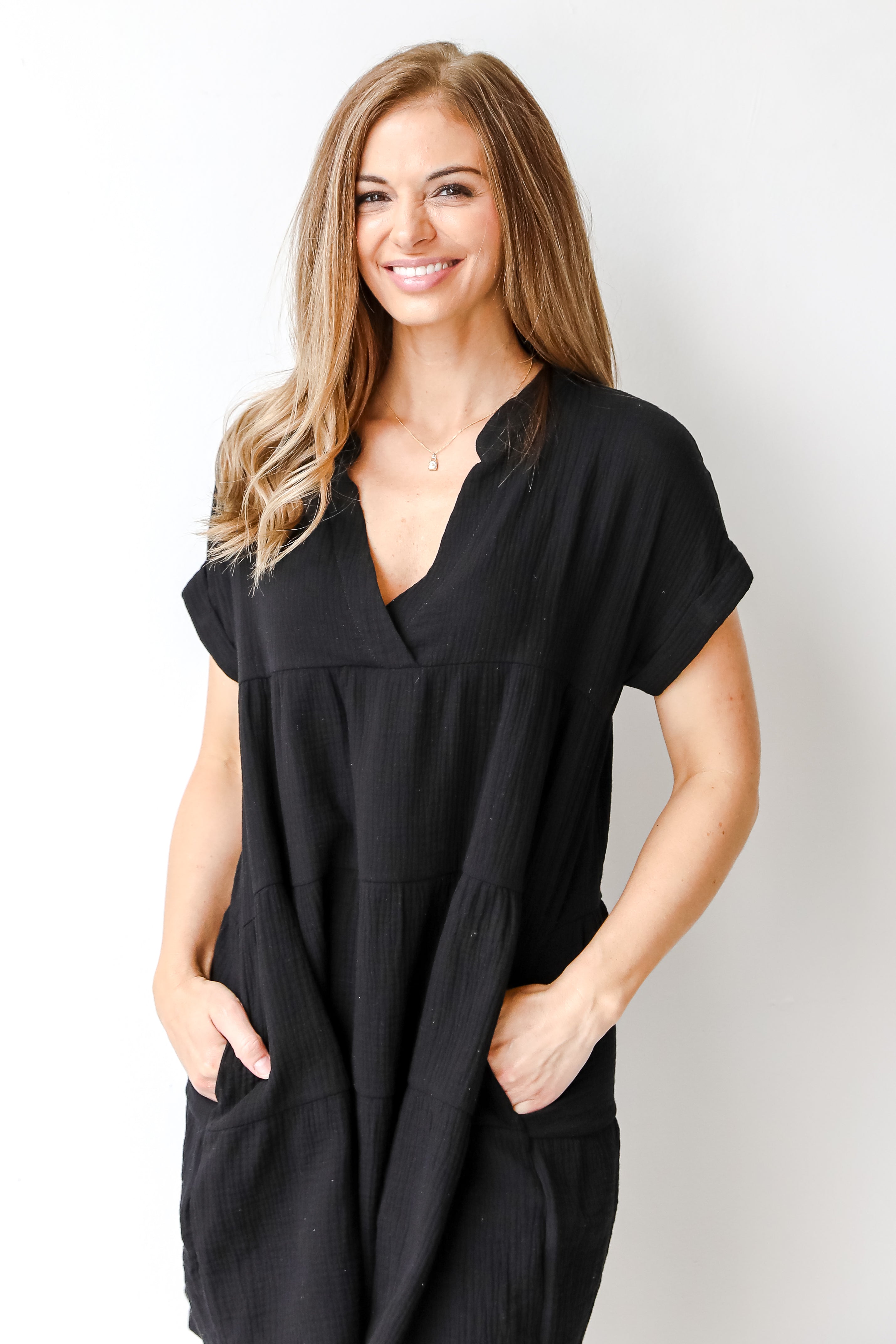 Linen Tiered Mini Dress in black on model