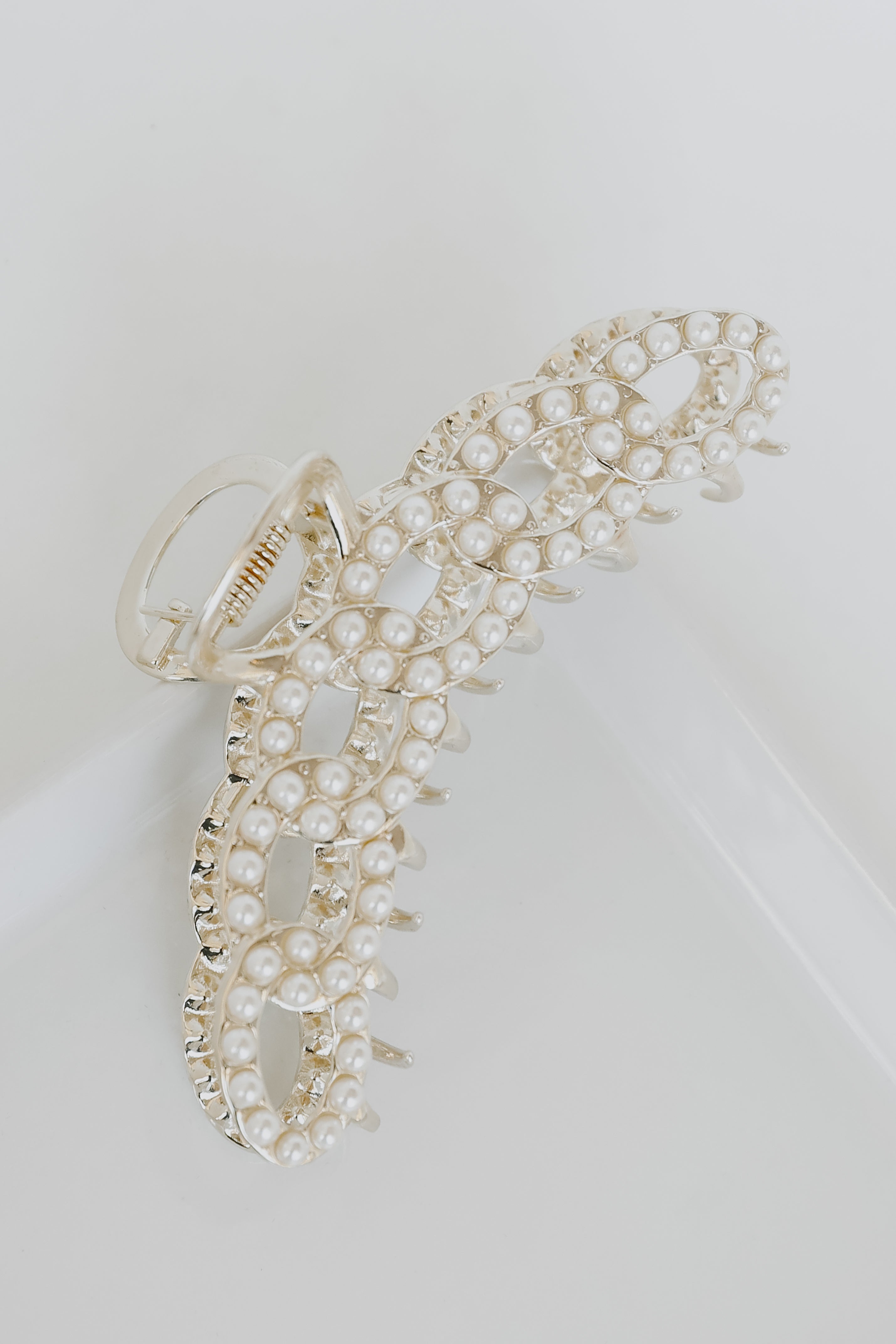 Pearl Claw Hair Clip flat lay