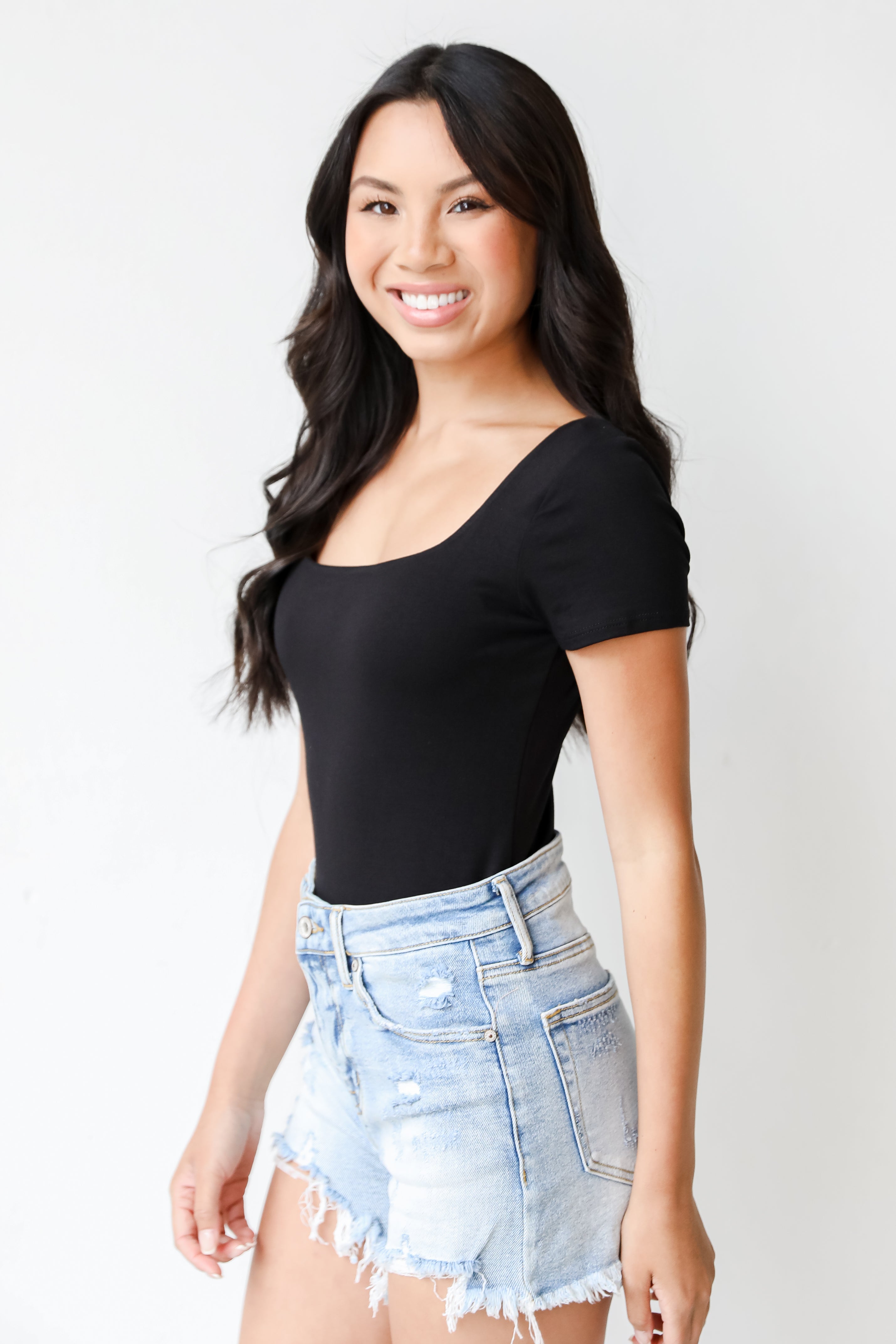 Bodysuit in black side view