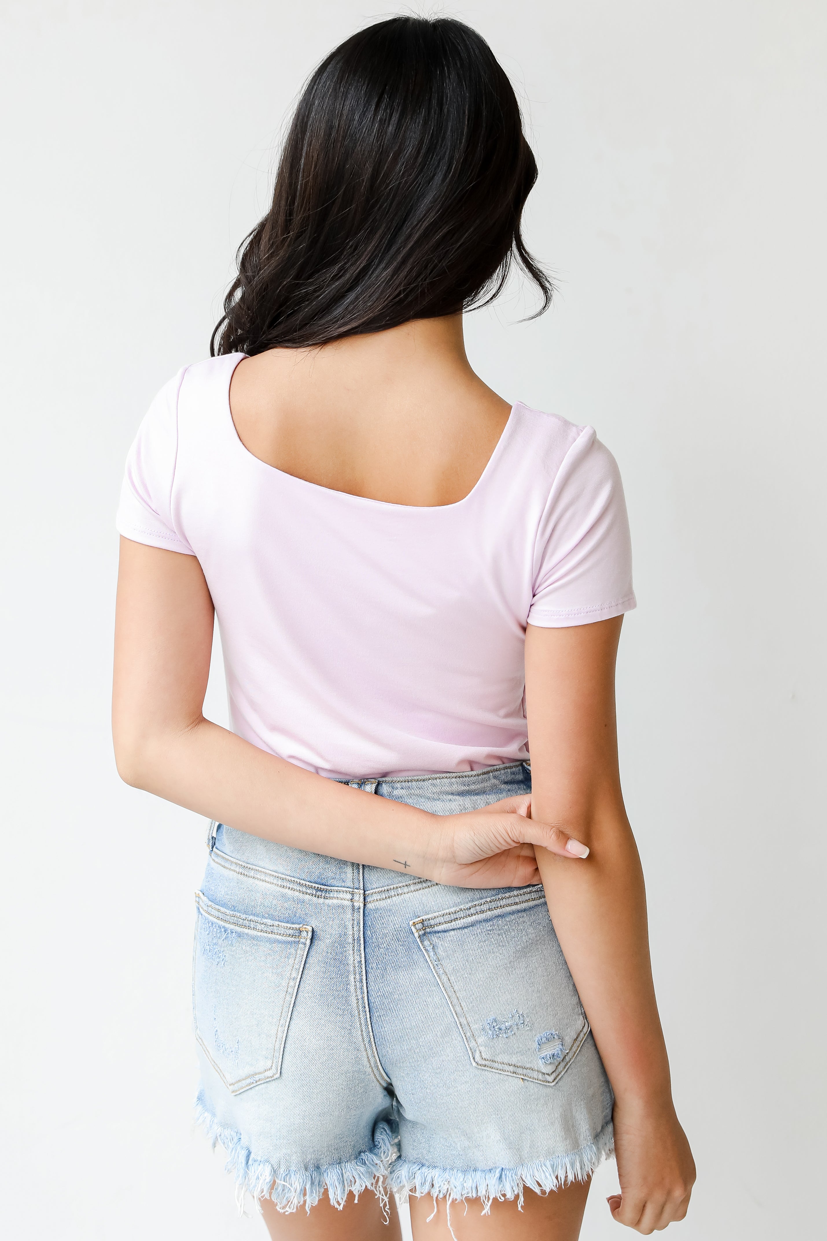Bodysuit in lilac back view