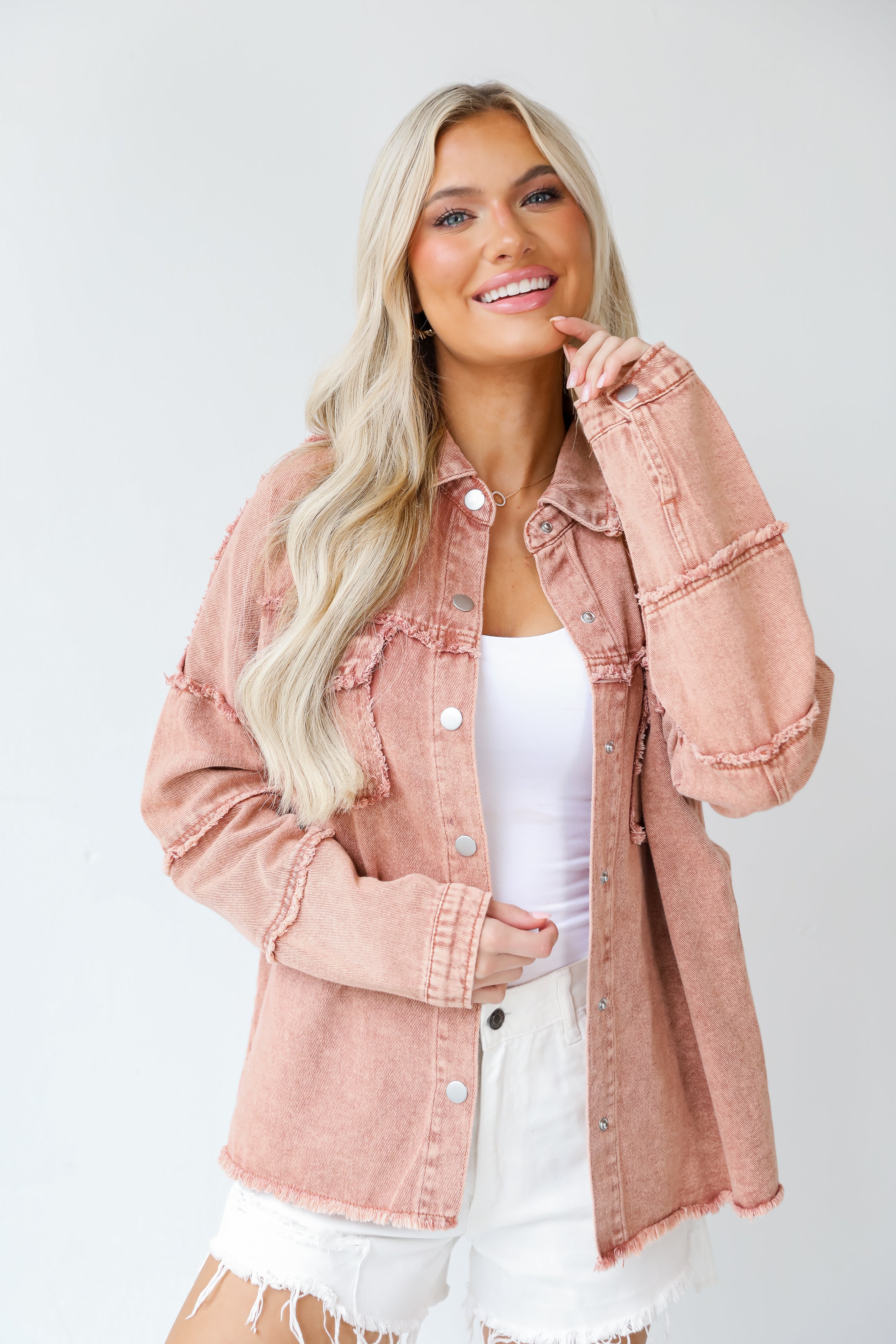 model wearing a smiley face Denim Jacket