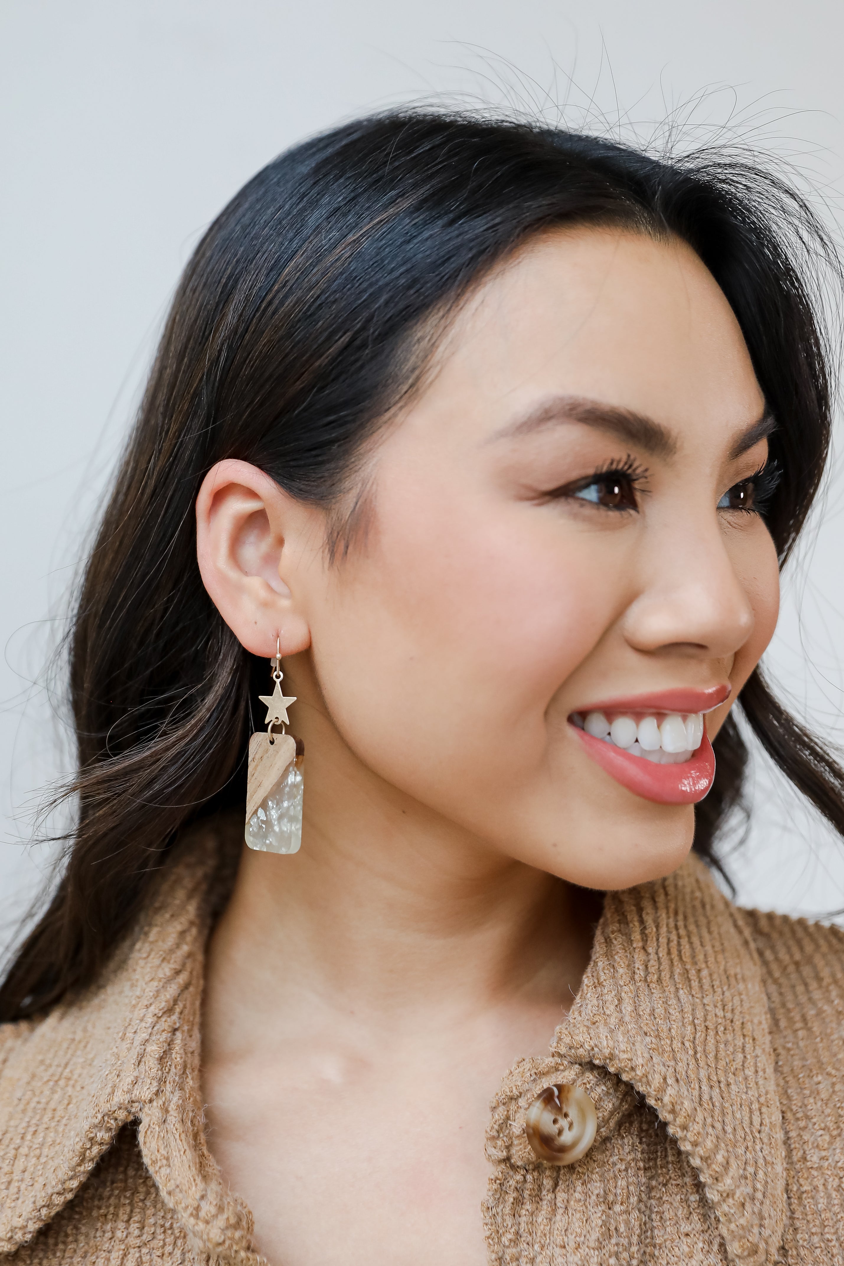 Star Drop Earrings on model