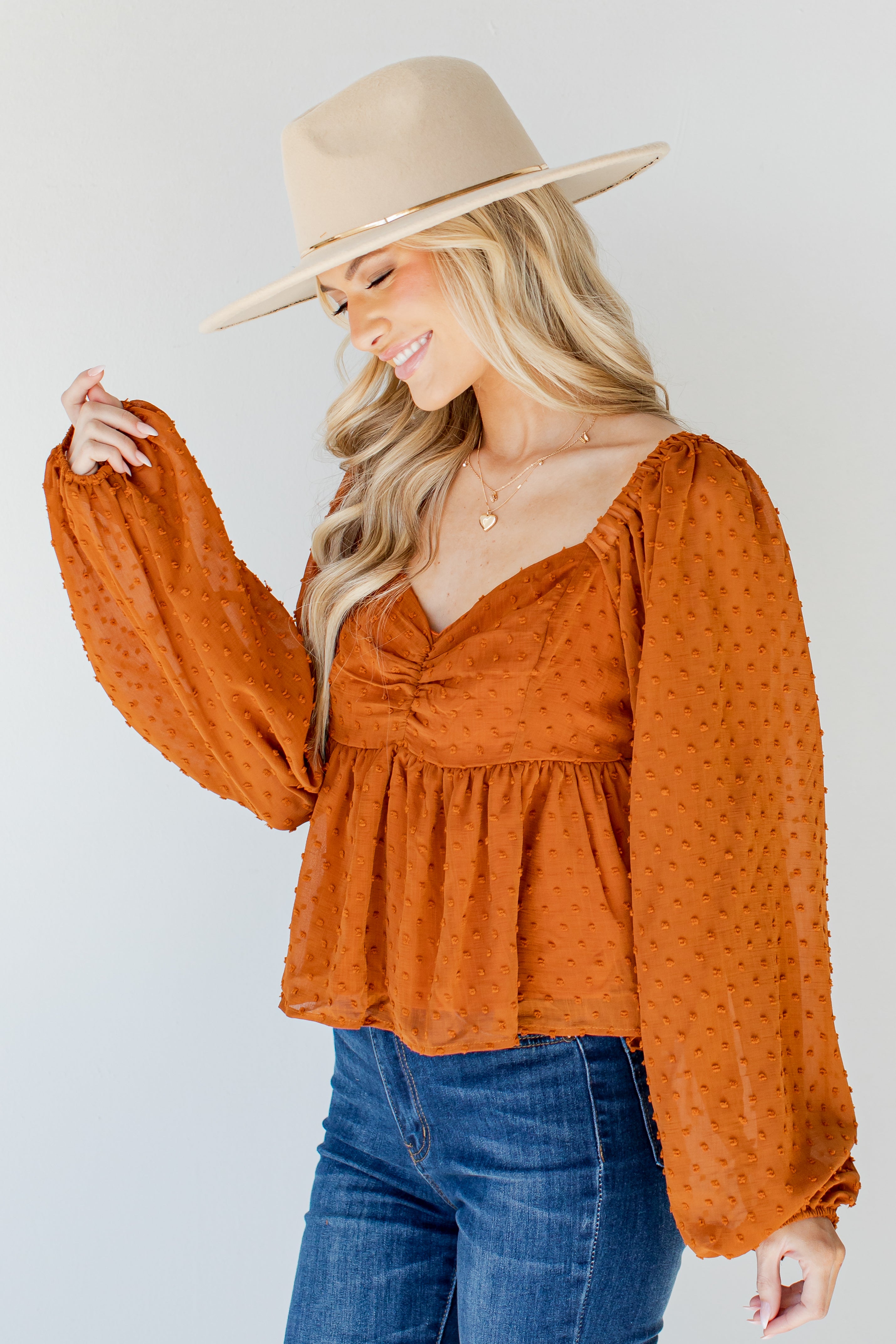 Swiss Dot Babydoll Blouse in rust side view