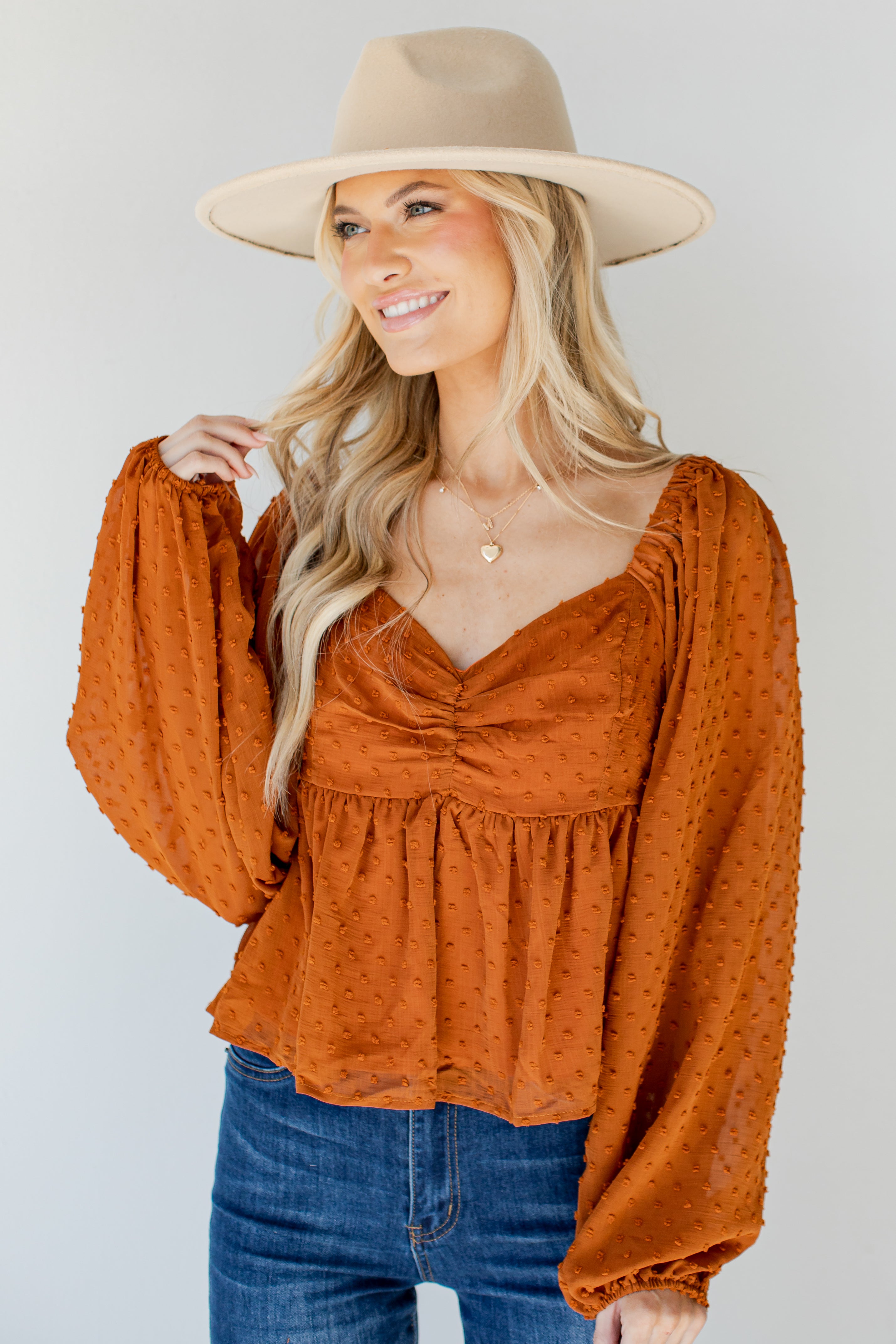 Swiss Dot Babydoll Blouse in rust front view