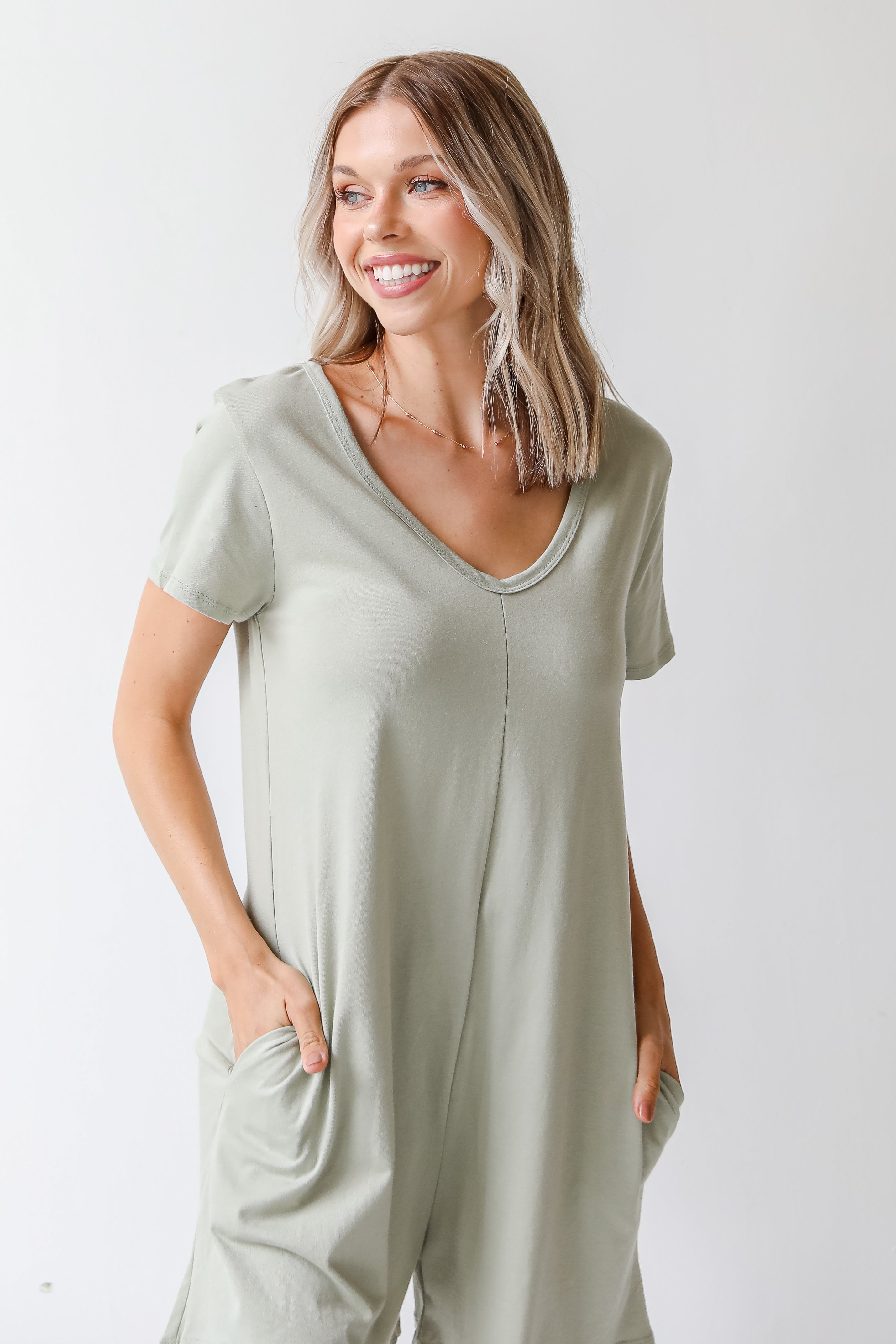 Romper in sage on model