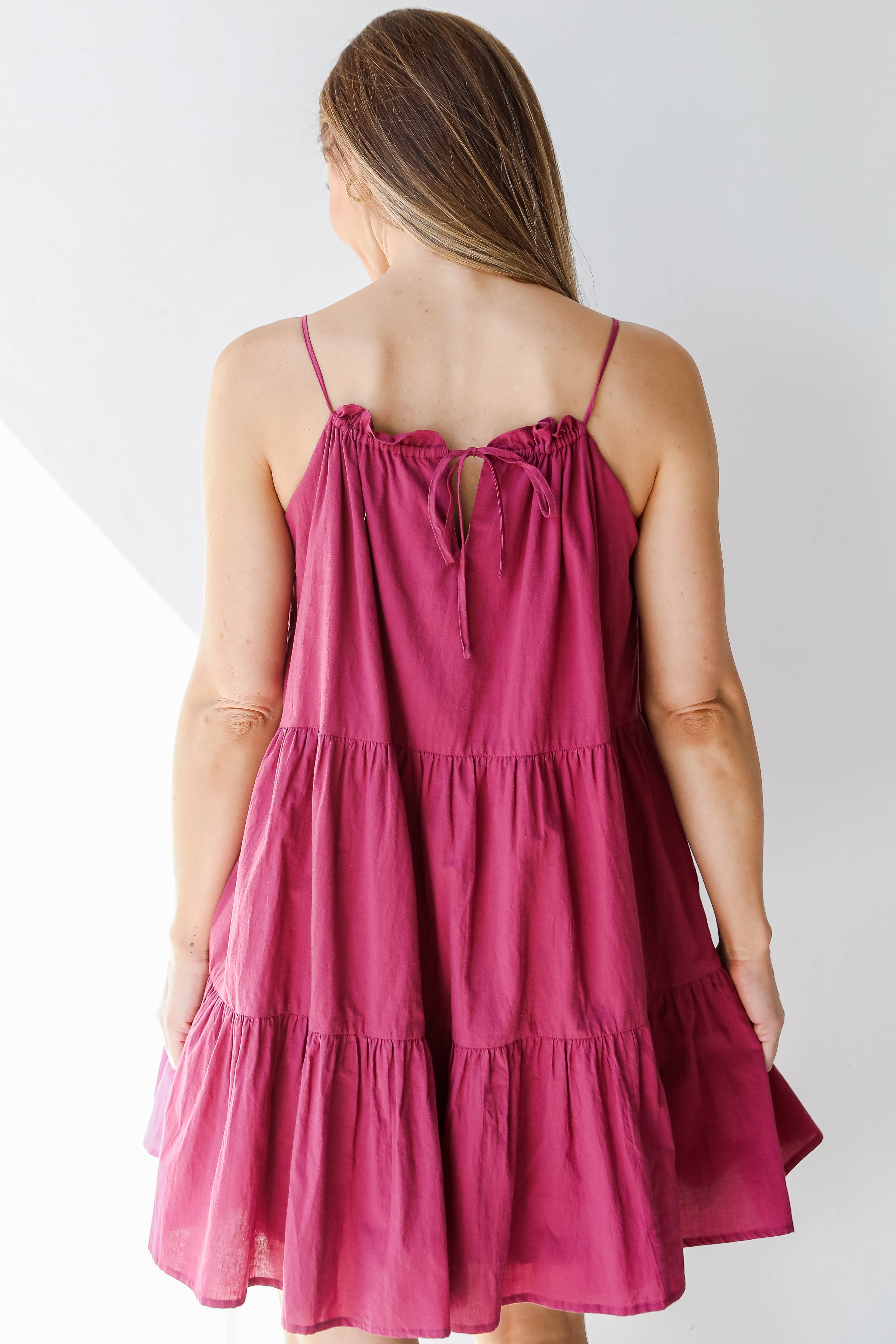 back view of a tiered mini dress