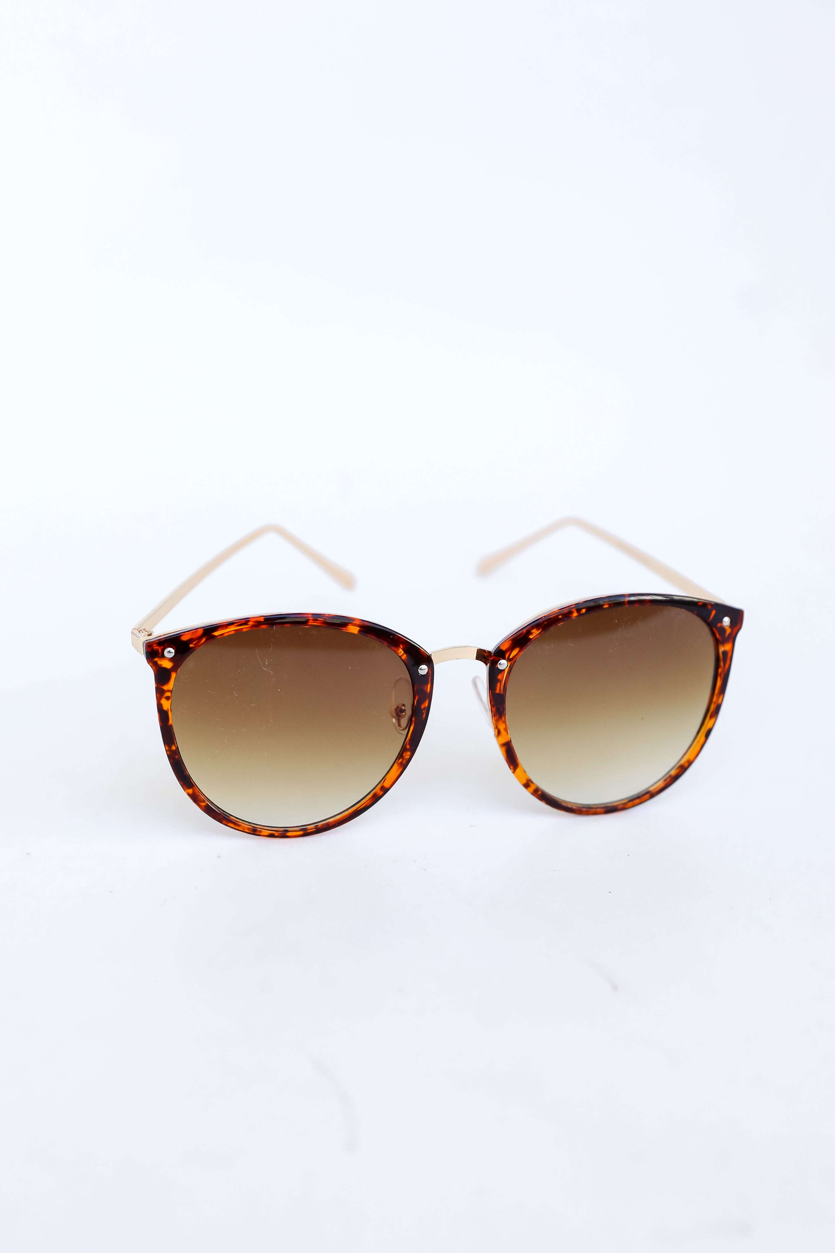 tortoise Round Sunglasses flat lay