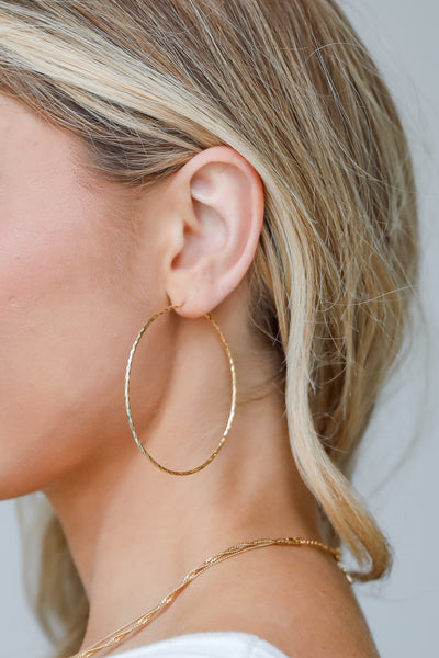 All That Glitters: Exploring the Versatility of Gold Hoop Earrings