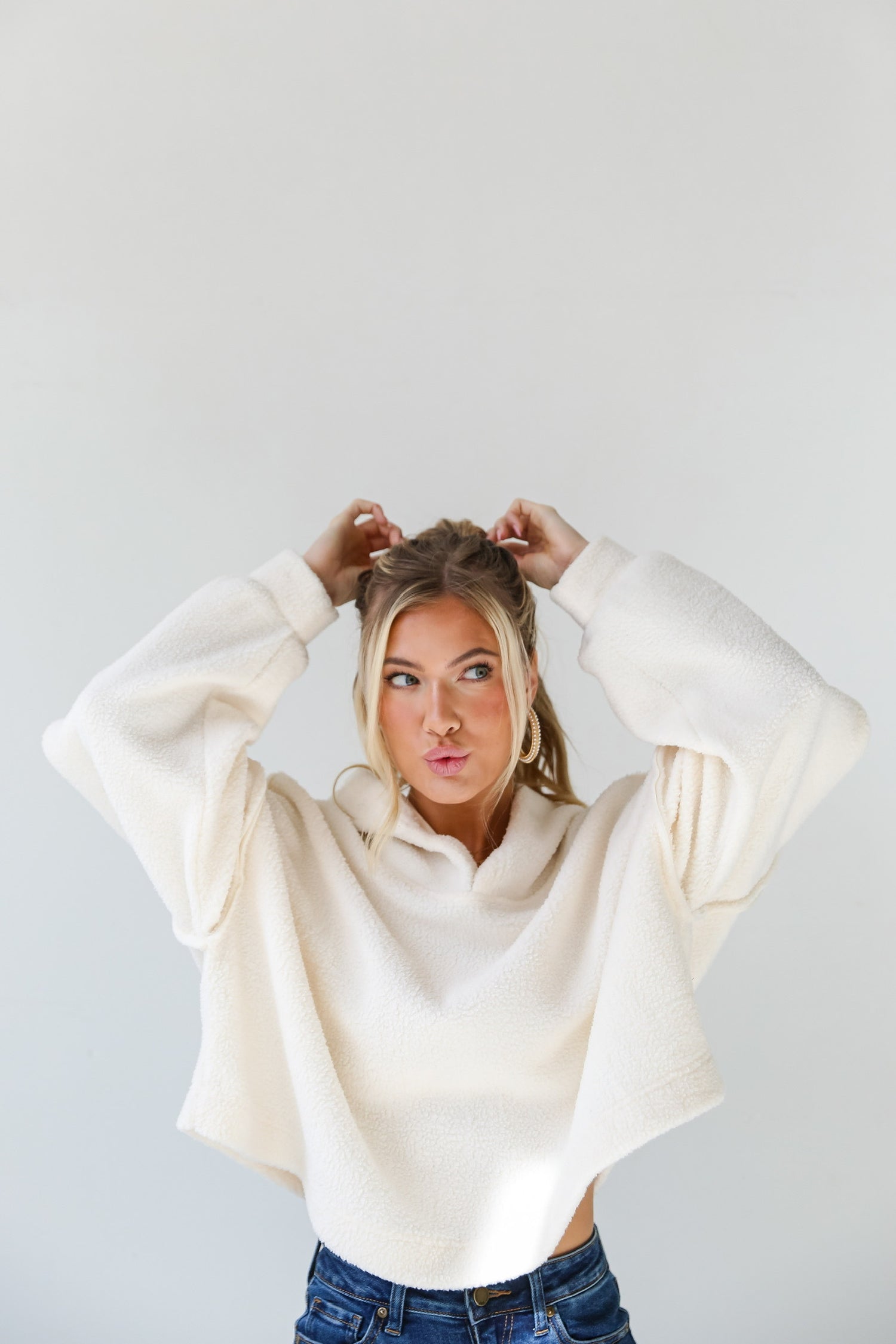 model wearing cute white pullover