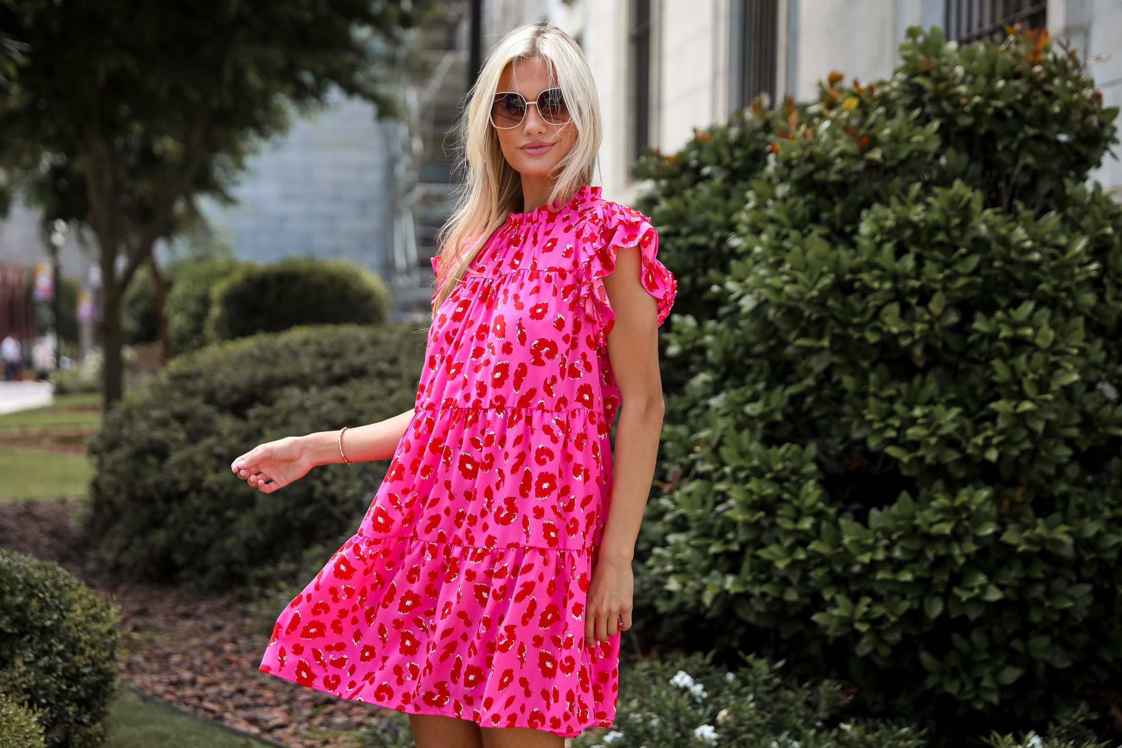 model wearing a cute pink mini dress