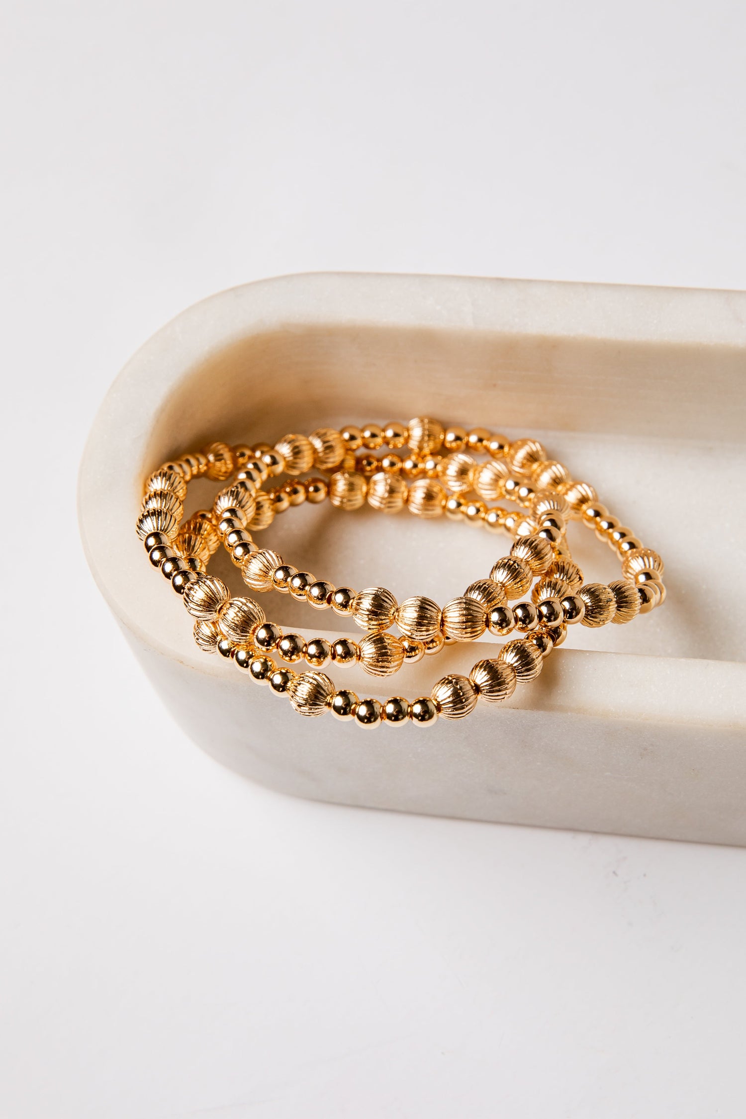 gold beaded bracelets from shop dress up boutique 