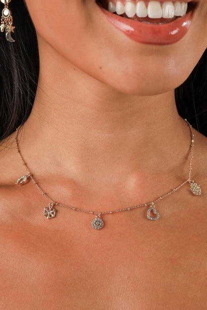 Necklace with heart-shaped pendants worn by a person