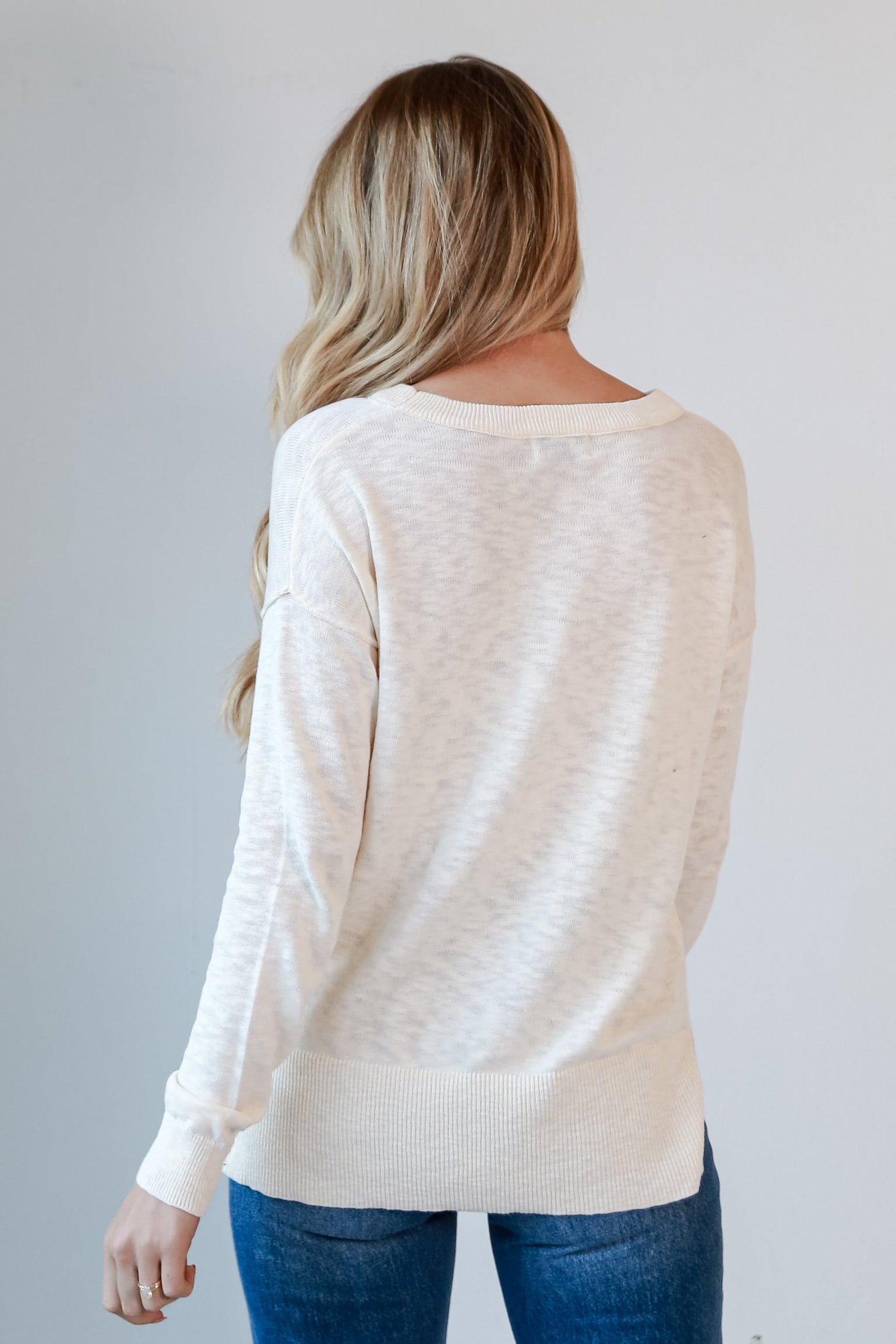 white knit top