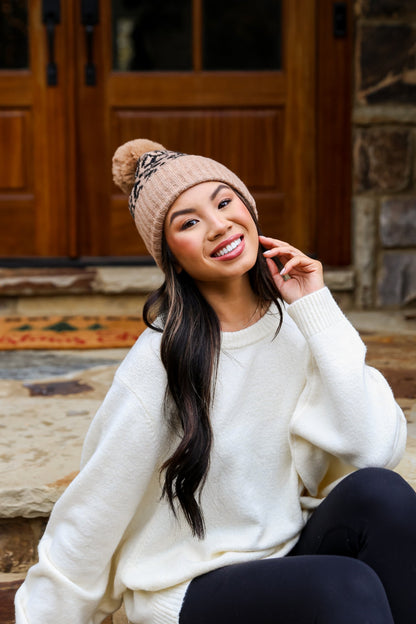 brown Leopard Pom Pom Beanie on model