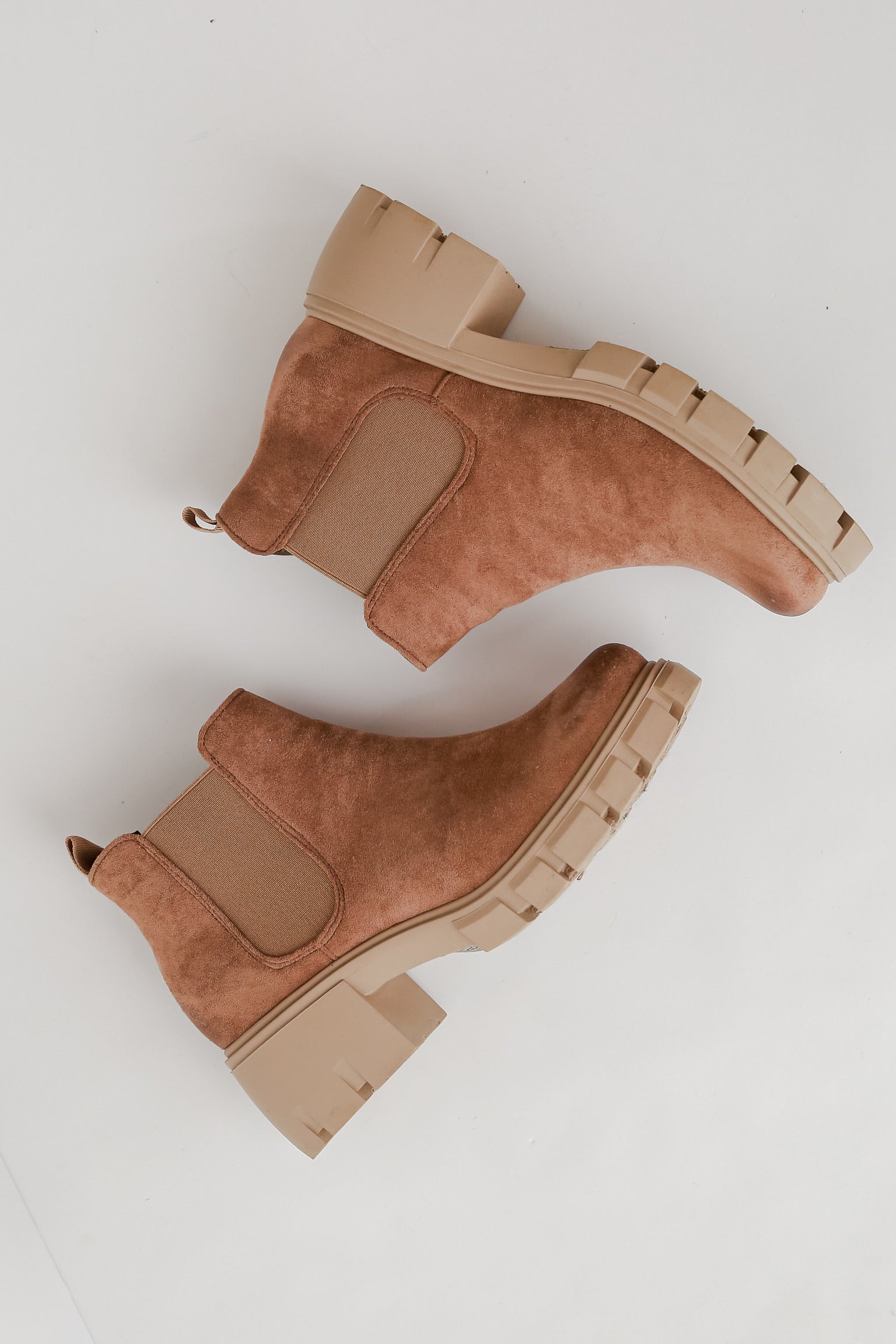 cute booties for women. lug sole boots. shoe trend for 2023. camel boots.