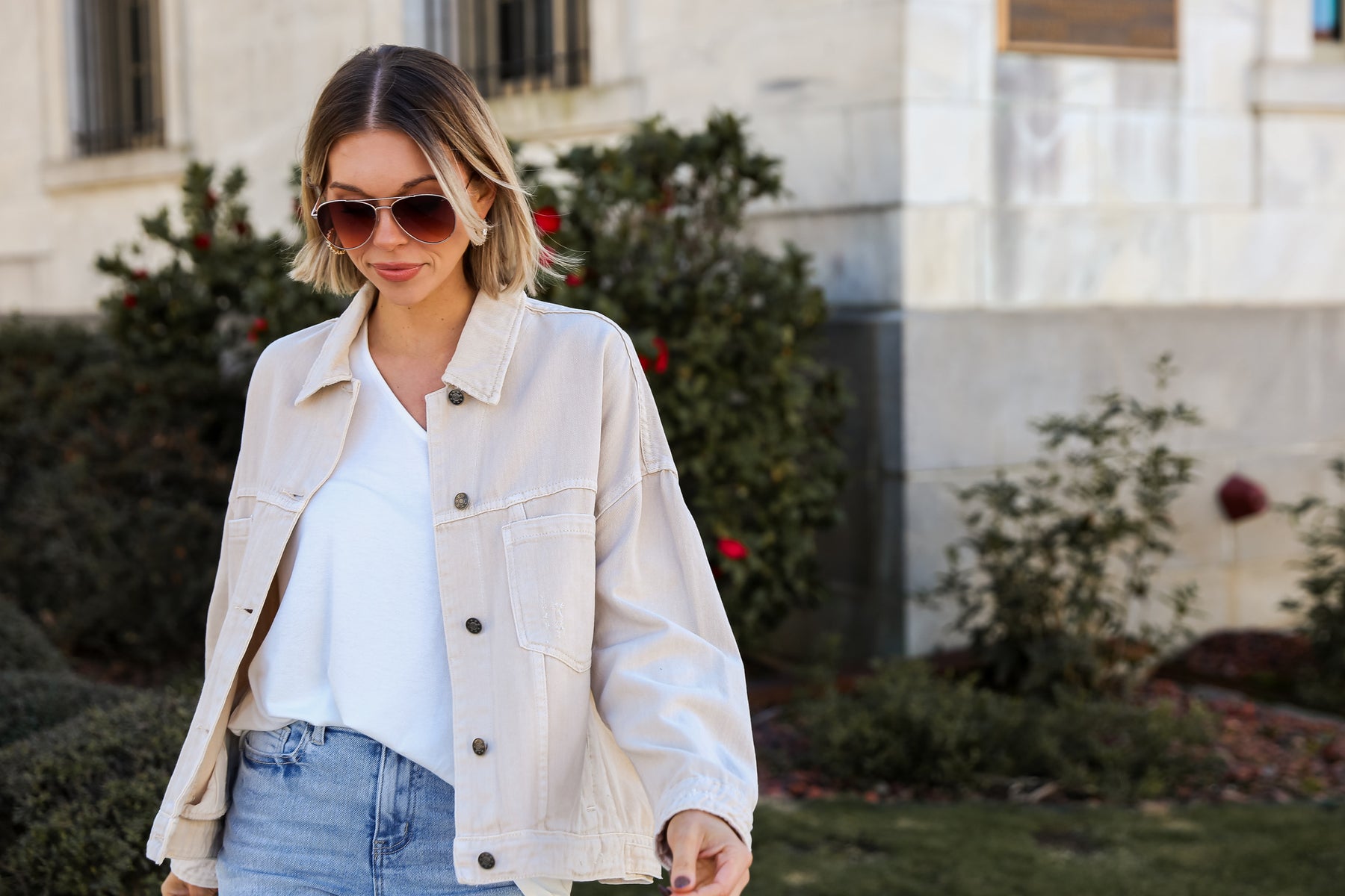 model wearing cute, taupe denim jacket for spring - cute spring jackets