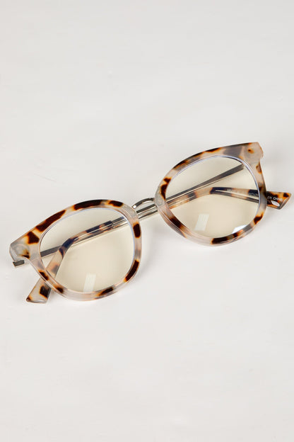 Tortoiseshell sunglasses on a white background