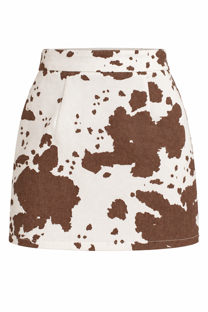 A high-waisted A-line mini skirt with a brown and off-white cow print pattern, shown against a plain white background.