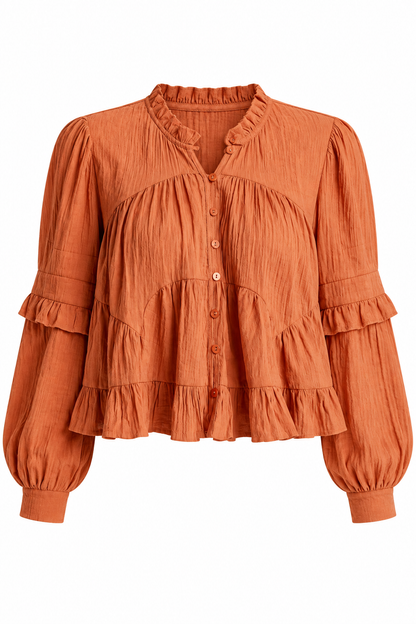 An orange crinkled cotton blouse with long balloon sleeves, ruffled trim, and a button-up front, shown on a plain white background.