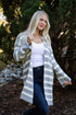 Woman wearing a striped cardigan outdoors