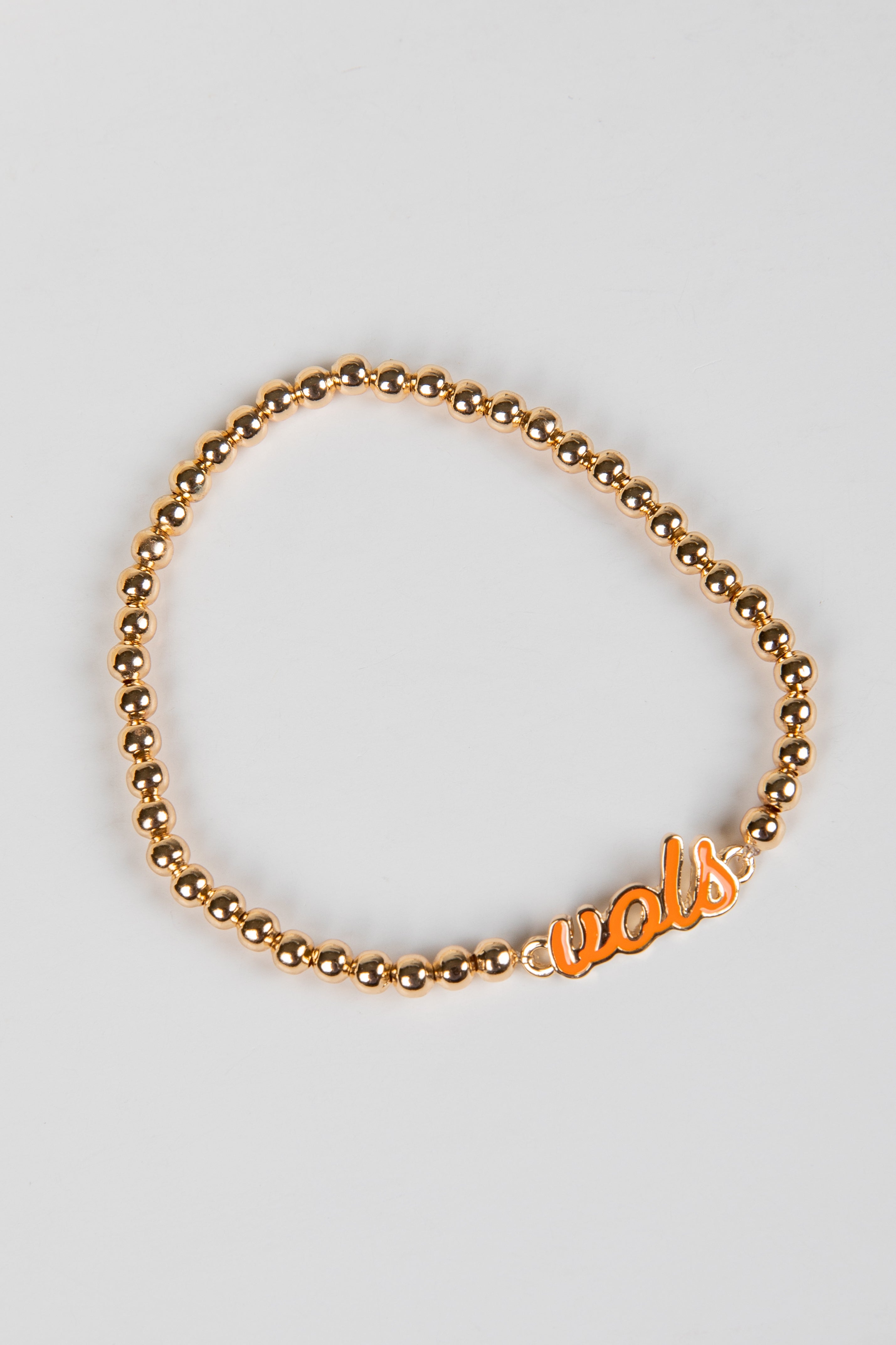 Gold beaded bracelet with &
