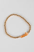 Gold beaded bracelet with &